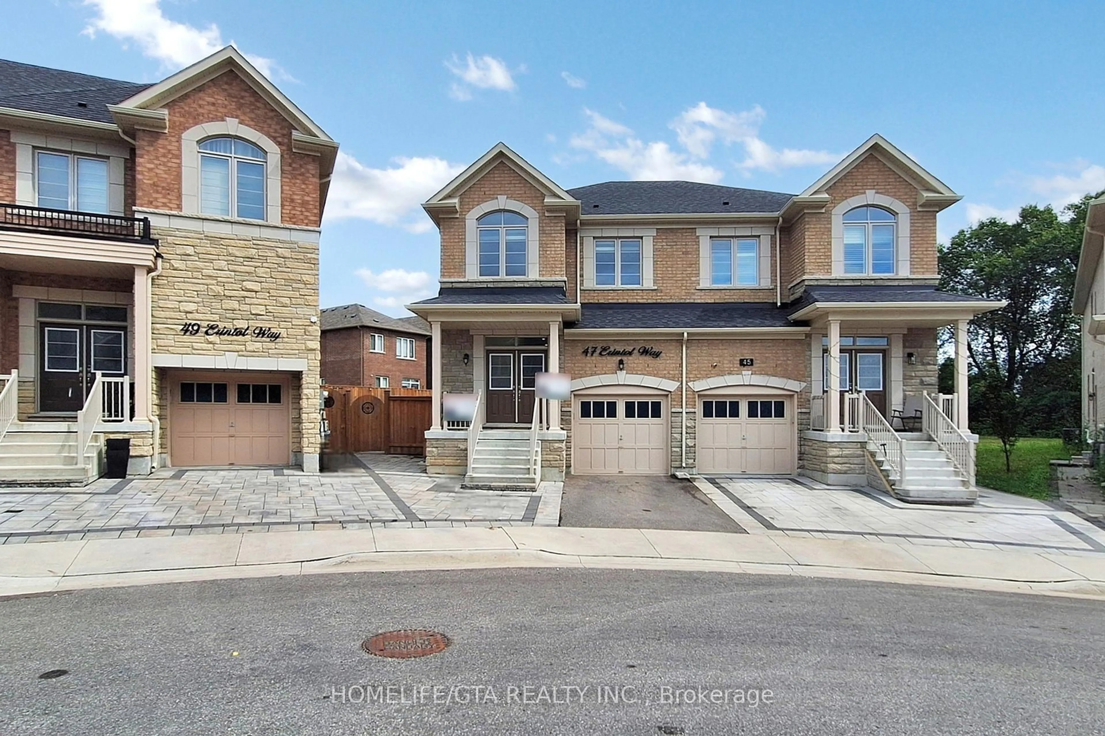 Home with brick exterior material, street for 47 Erintol Way, Markham Ontario L3S 0E6