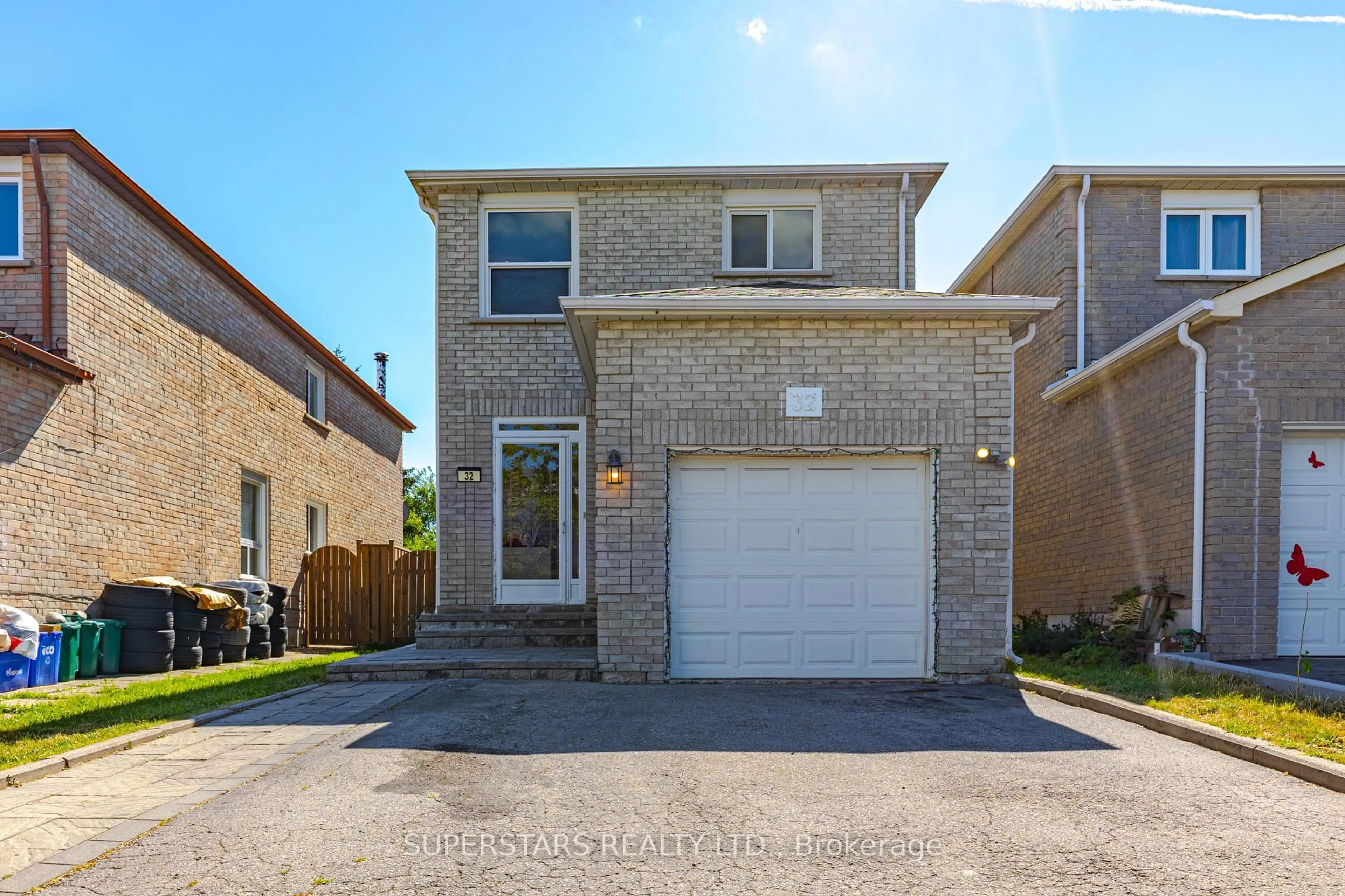 Home with brick exterior material, street for 32 Neeland Rd, Markham Ontario L3S 1W9