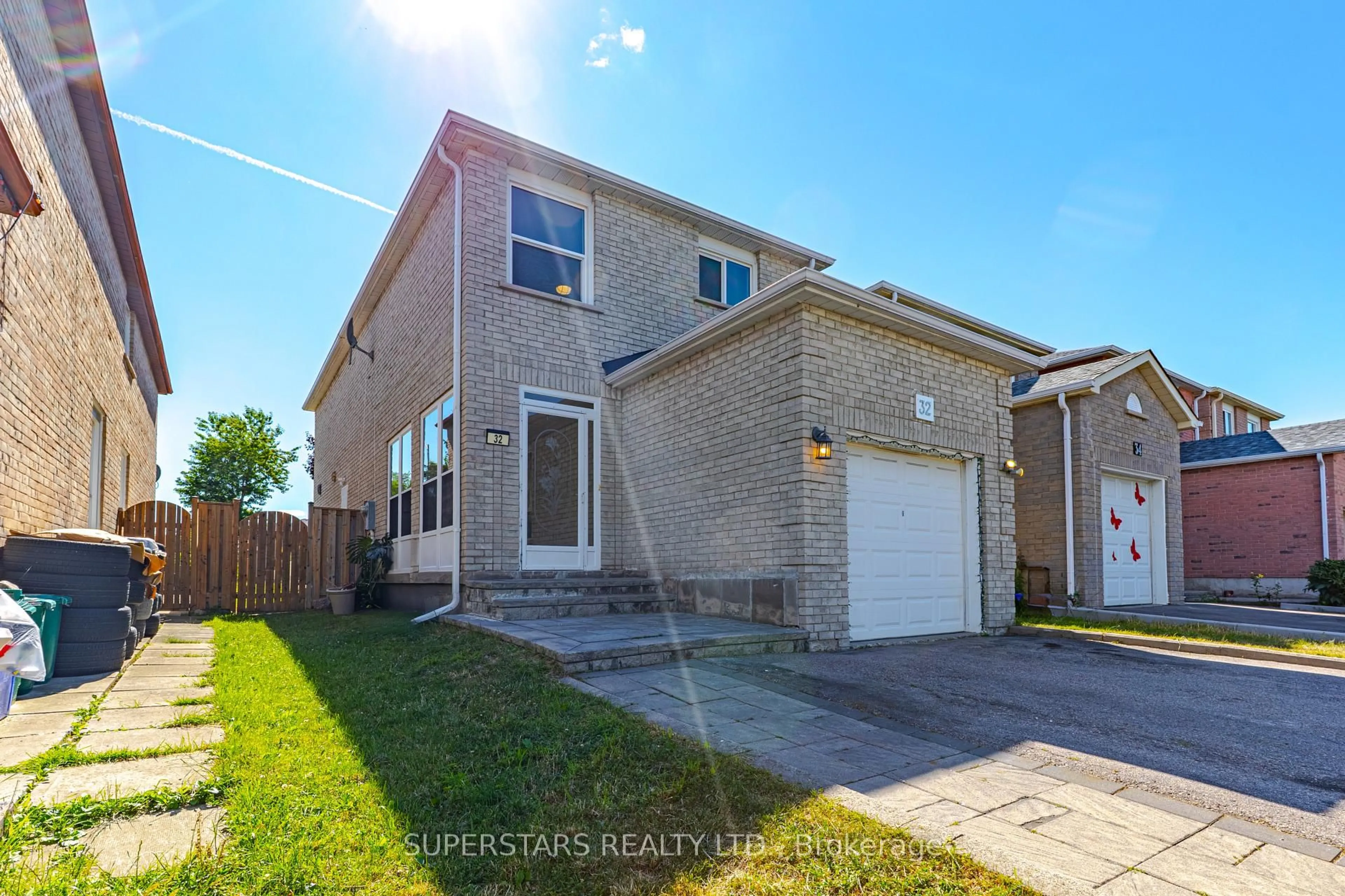 Home with brick exterior material, street for 32 Neeland Rd, Markham Ontario L3S 1W9