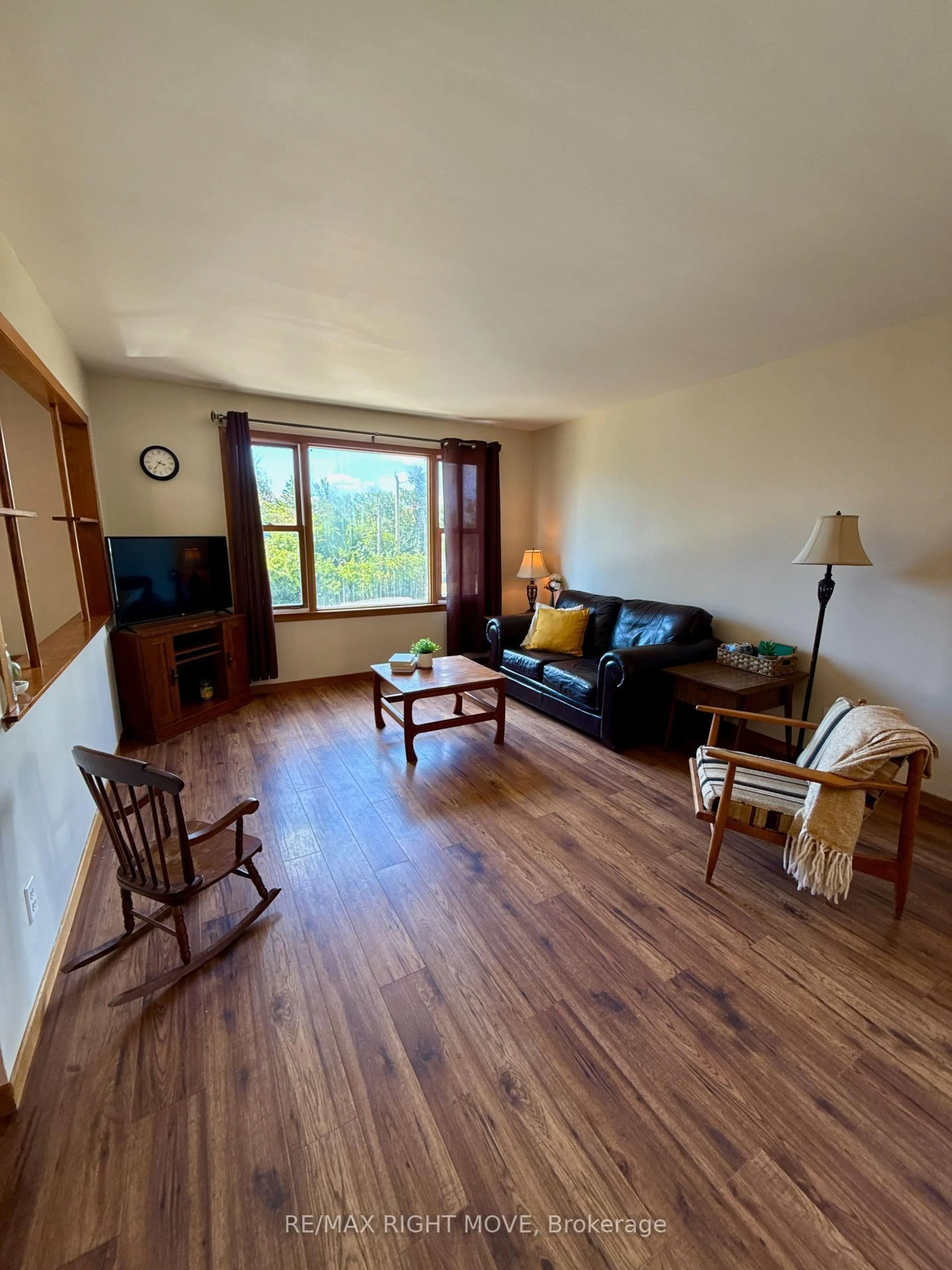 Living room with furniture, wood/laminate floor for 449 May St, Brock Ontario L0K 1A0