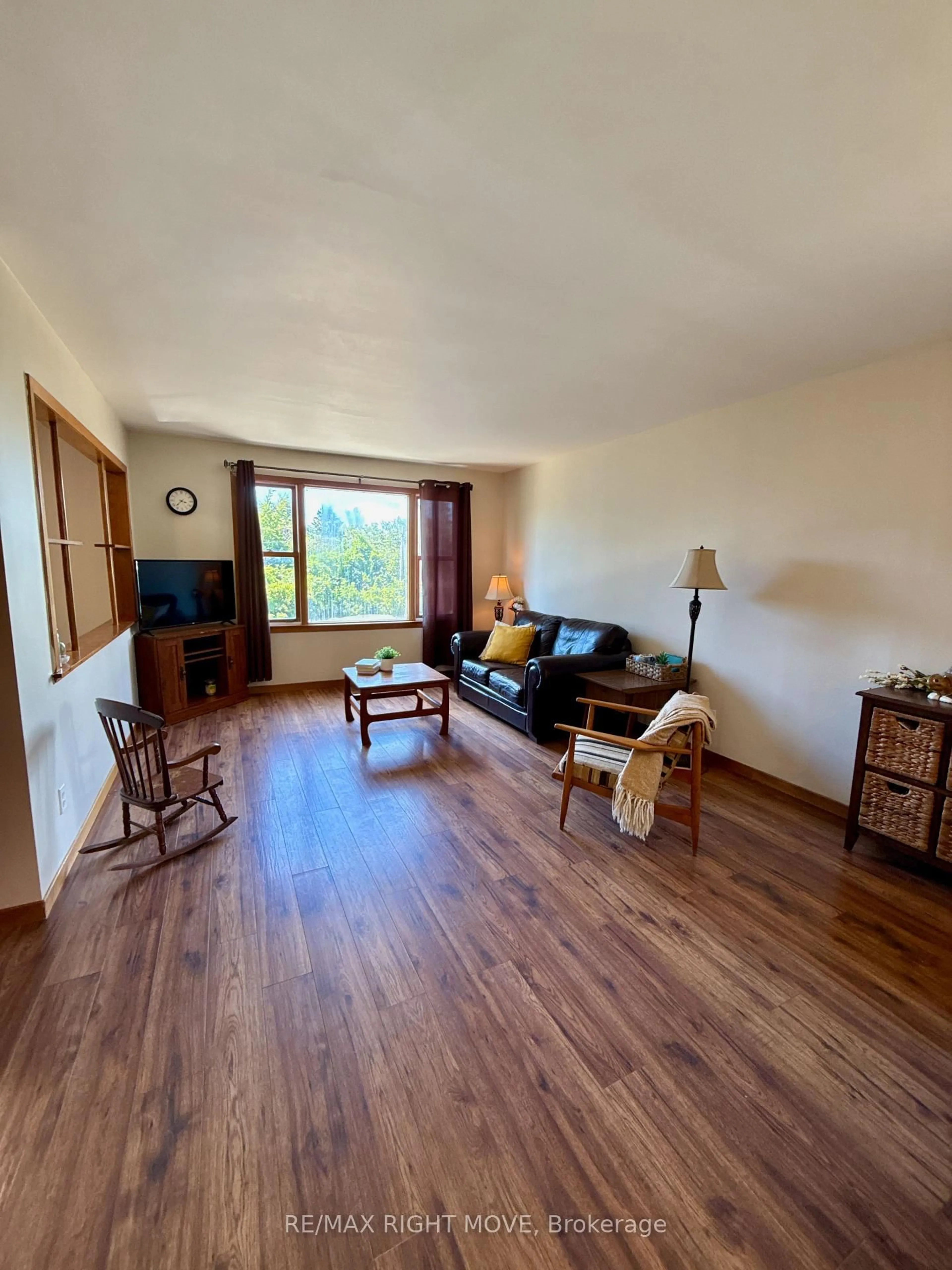 Living room with furniture, wood/laminate floor for 449 May St, Brock Ontario L0K 1A0