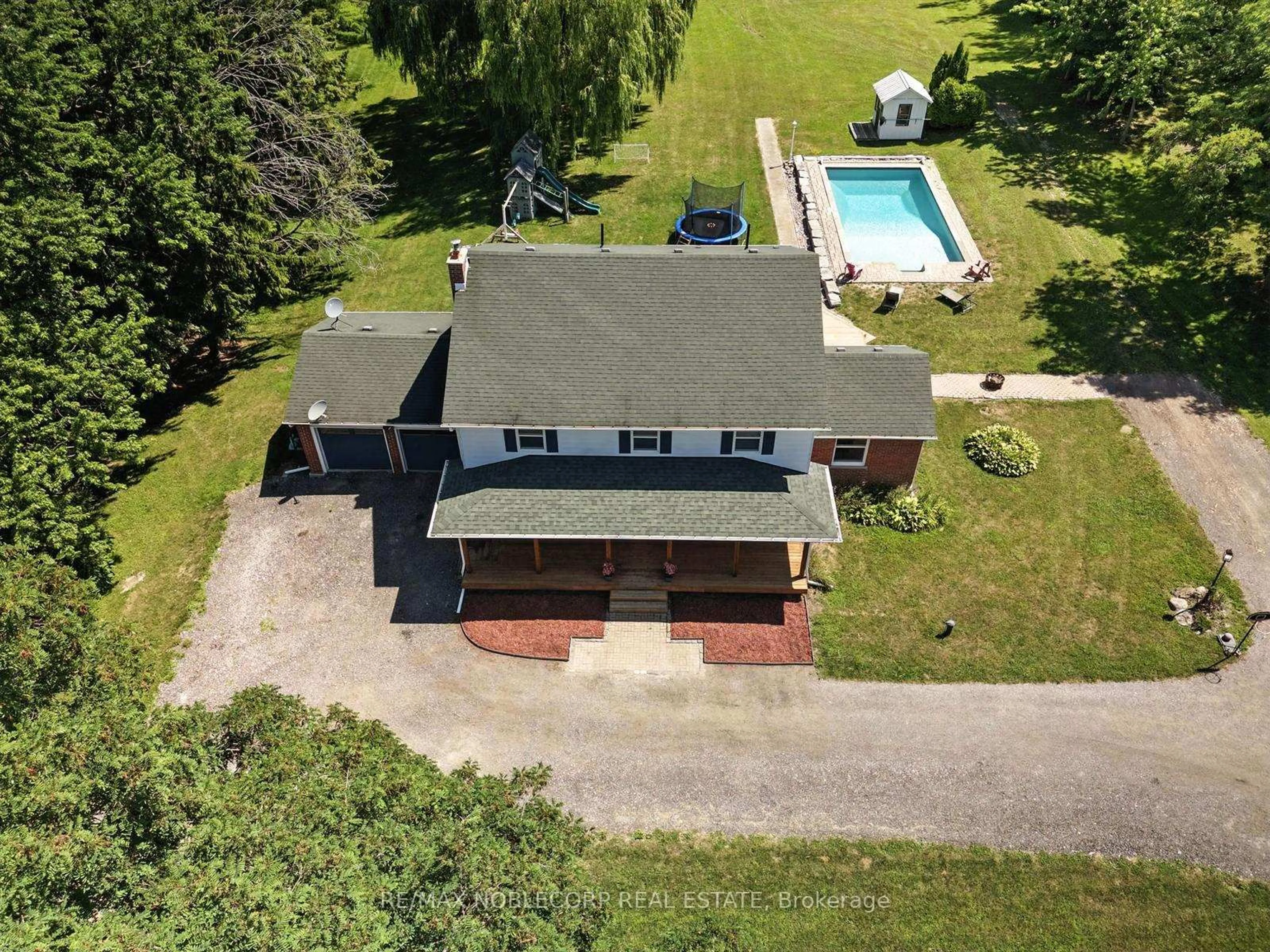 A pic from outside/outdoor area/front of a property/back of a property/a pic from drone, unknown for 2037 15th Sdrd, New Tecumseth Ontario L0G 1W0