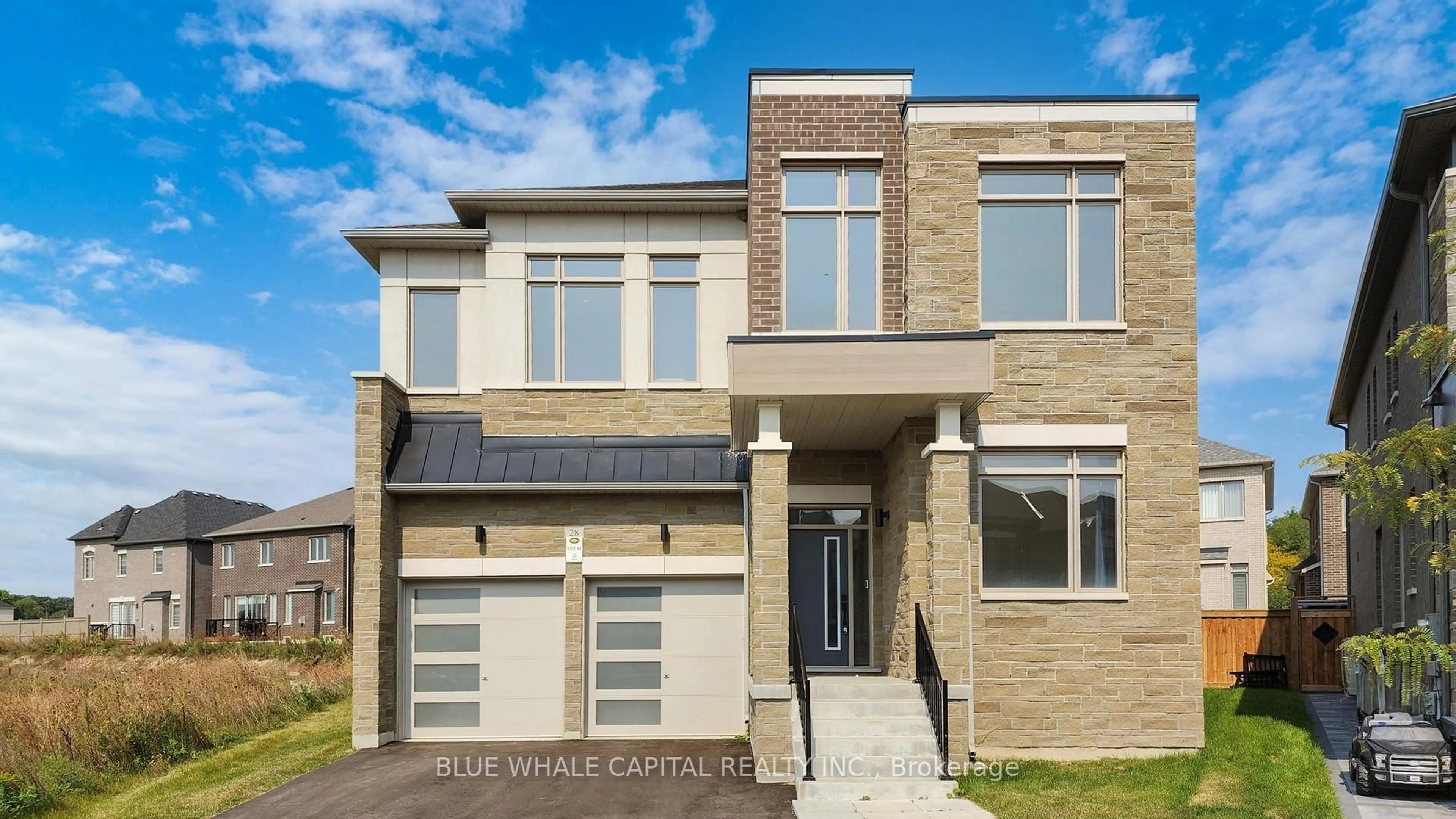 Home with brick exterior material, street for 28 Tipp Dr, Richmond Hill Ontario L4E 1A2