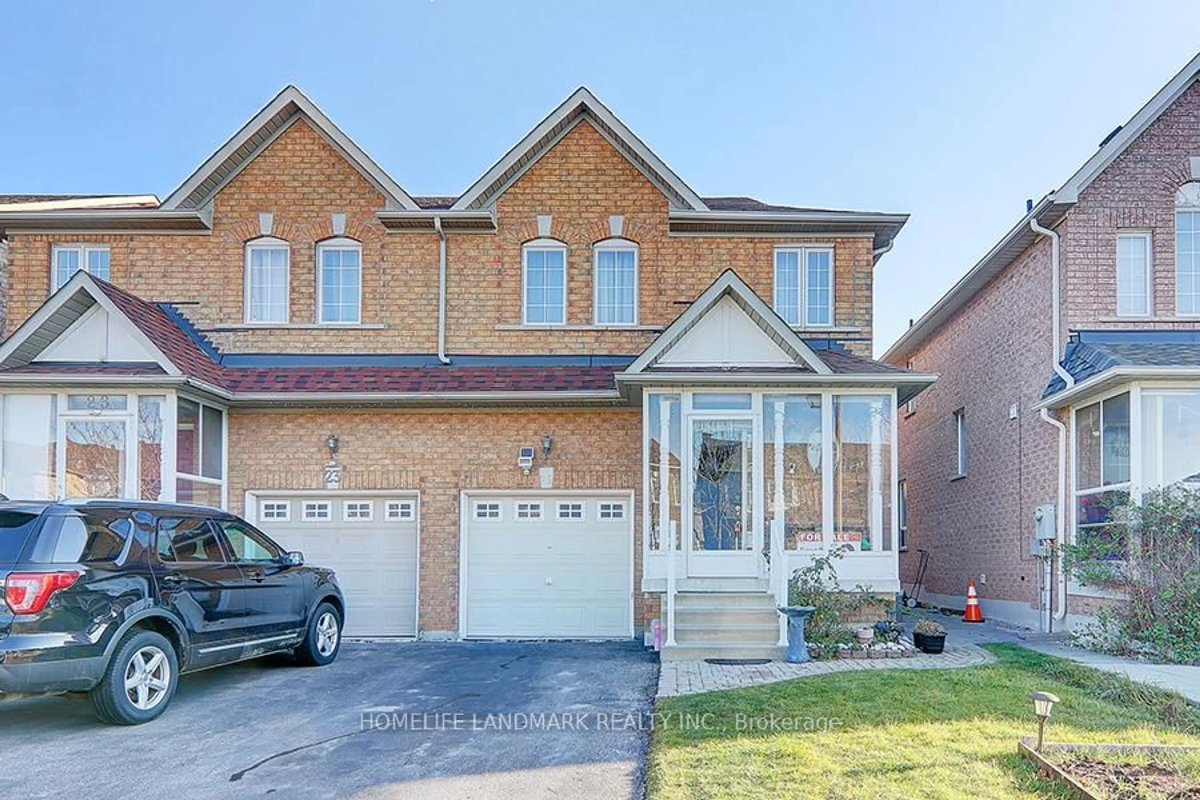 Home with brick exterior material, street for 21 Raintree Dr, Markham Ontario L3R 5T9