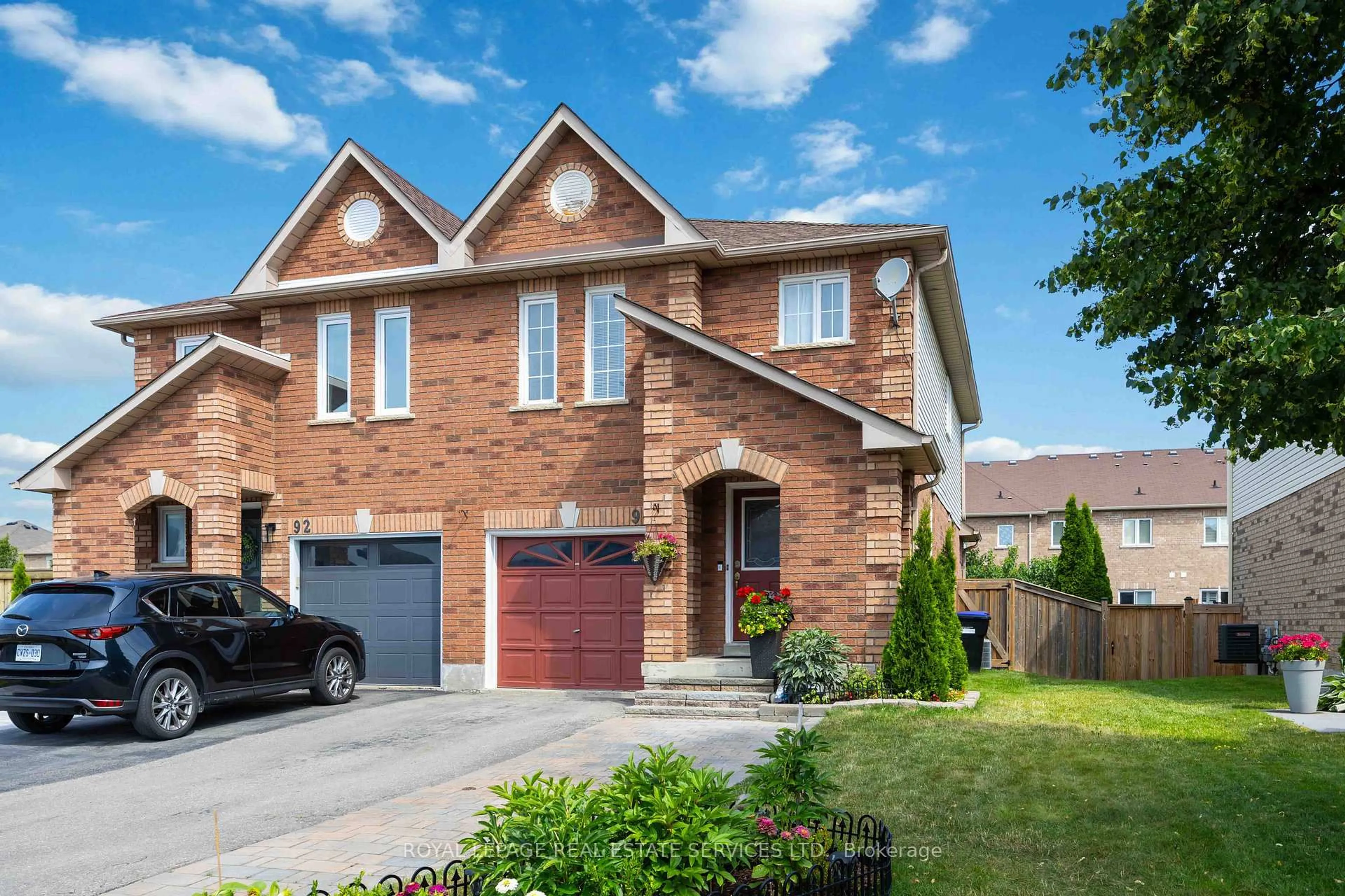 Home with brick exterior material, street for 90 Breeze Dr, Bradford West Gwillimbury Ontario L3Z 3A5
