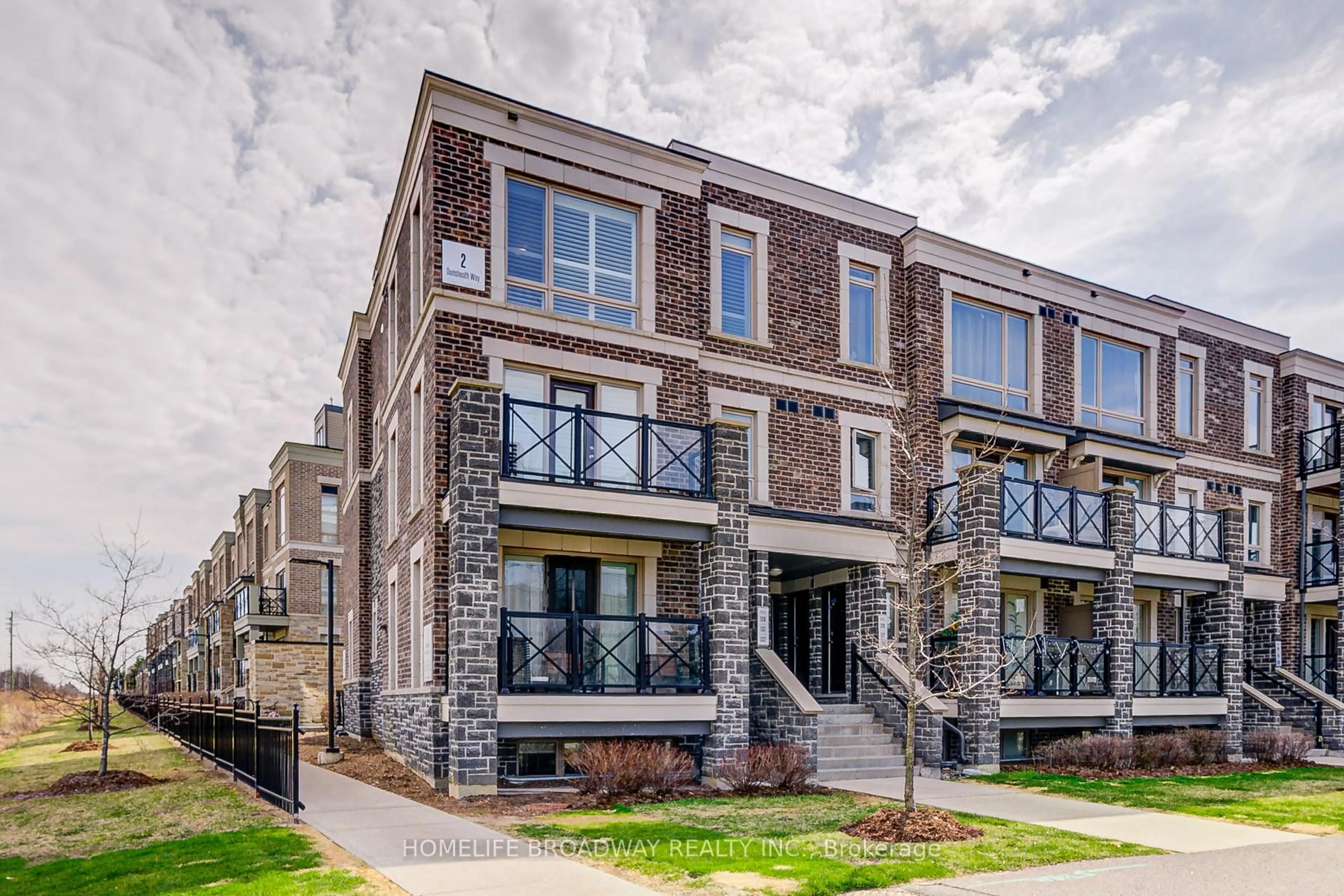 Home with brick exterior material, street for 2 Dunsheath Way #131, Markham Ontario L6B 1N3