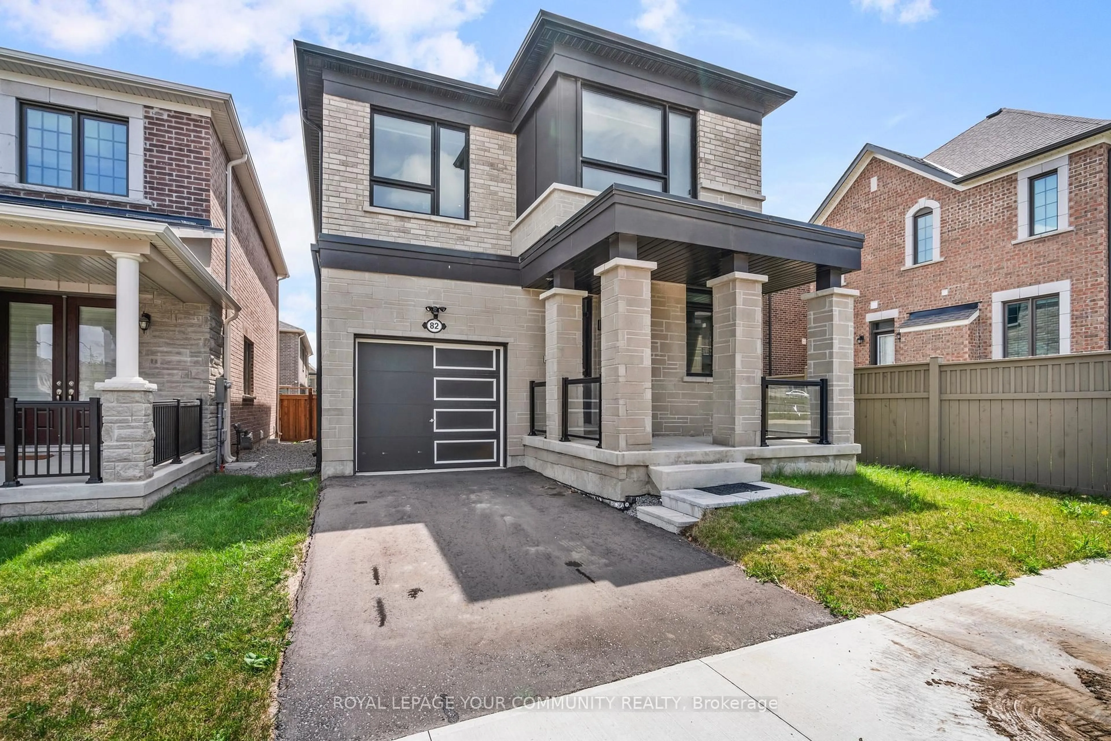 Home with brick exterior material, street for 82 NAVITAS Cres, Markham Ontario L6C 3K7