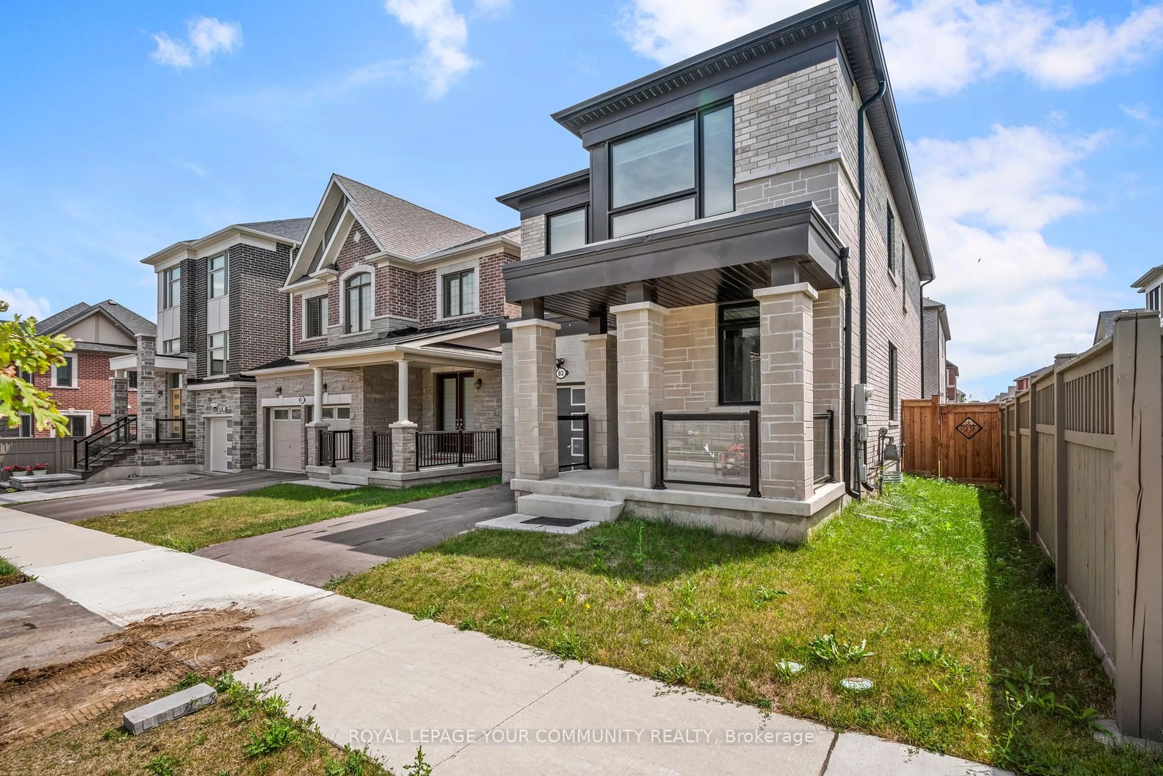 Home with brick exterior material, street for 82 NAVITAS Cres, Markham Ontario L6C 3K7
