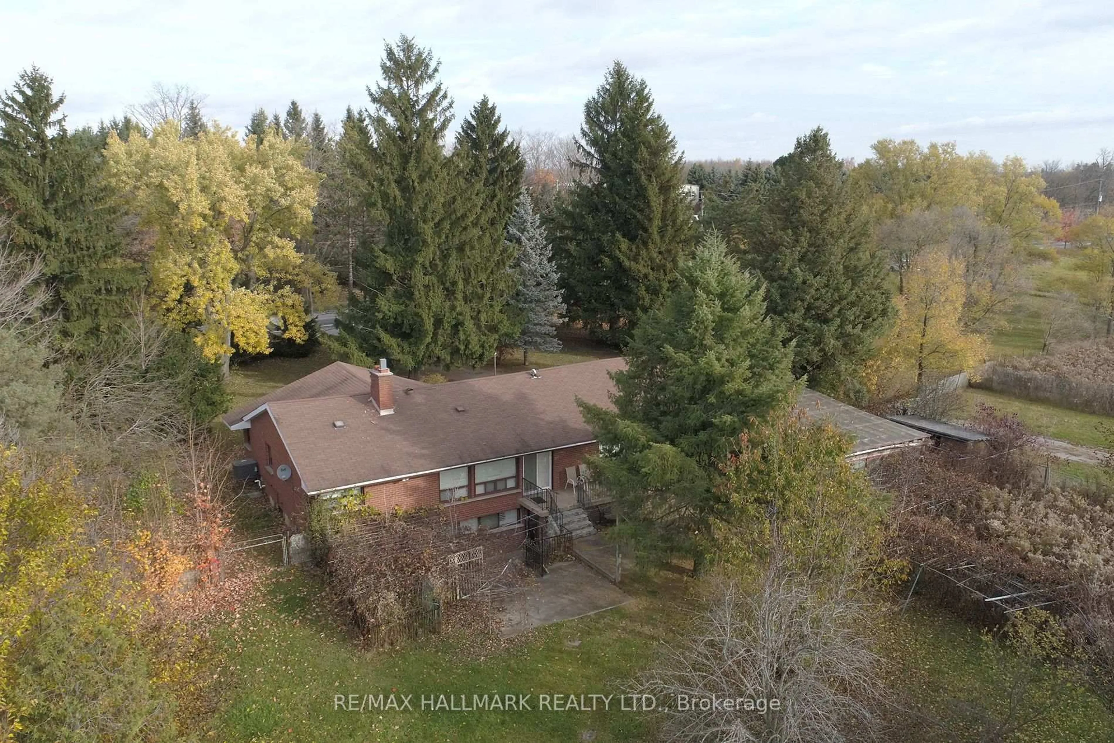 A pic from outside/outdoor area/front of a property/back of a property/a pic from drone, forest/trees view for 4805 19th Ave, Markham Ontario L6C 1M3