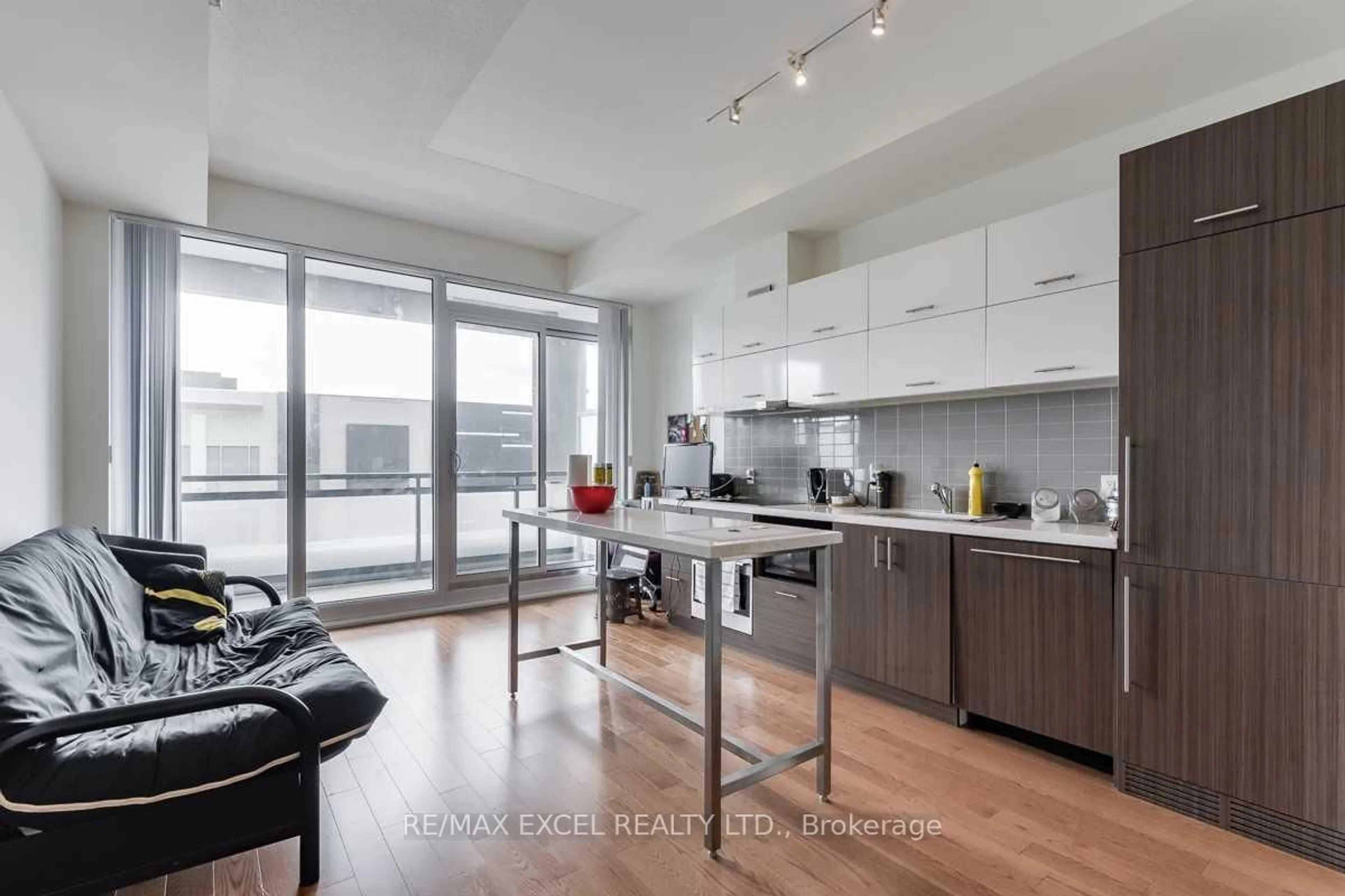 Open concept kitchen, wood/laminate floor for 180 Enterprise Blvd #410, Markham Ontario L6G 0G4