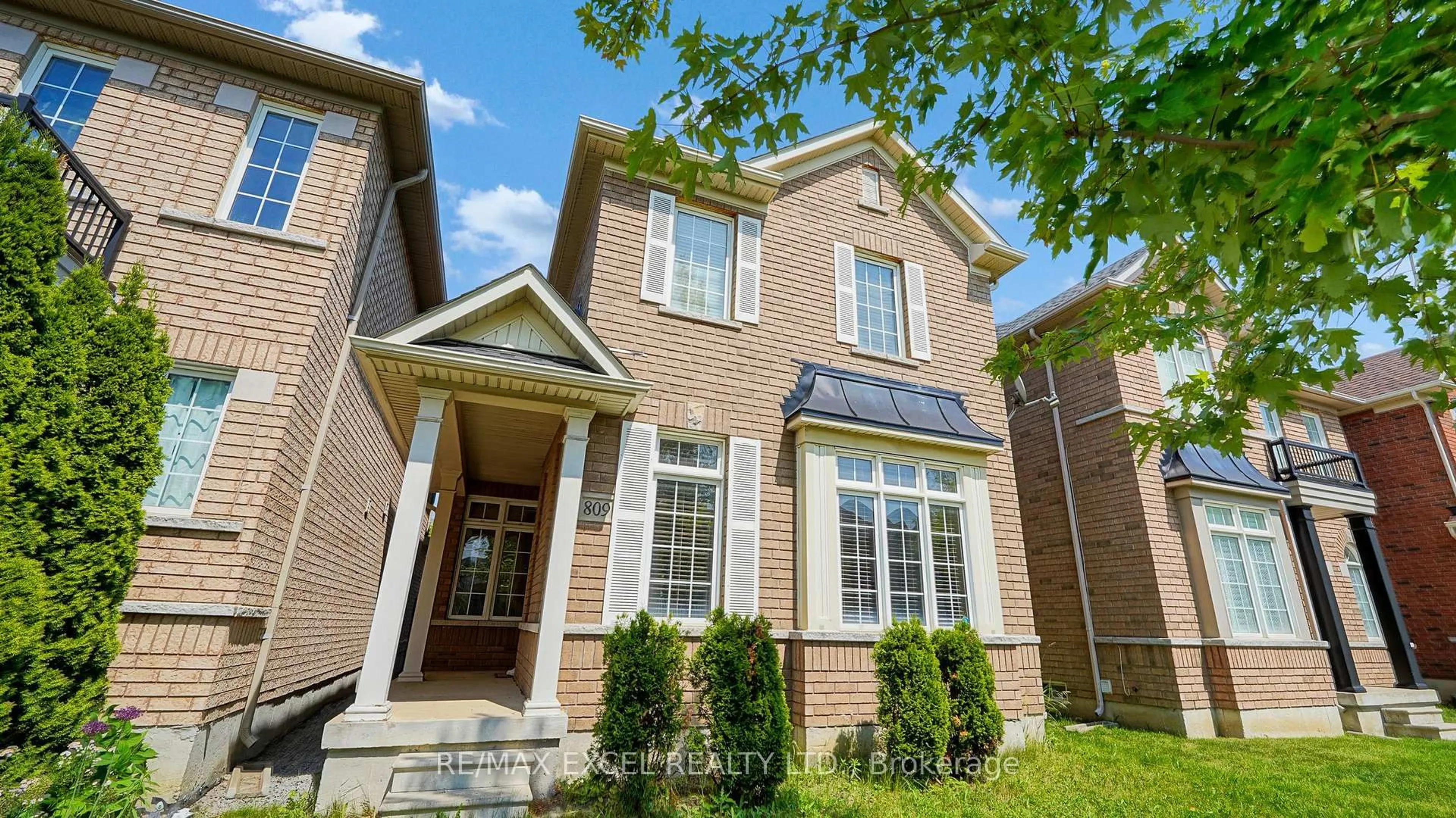 Home with brick exterior material, street for 809 Cornell Rouge Blvd, Markham Ontario L6B 0K5