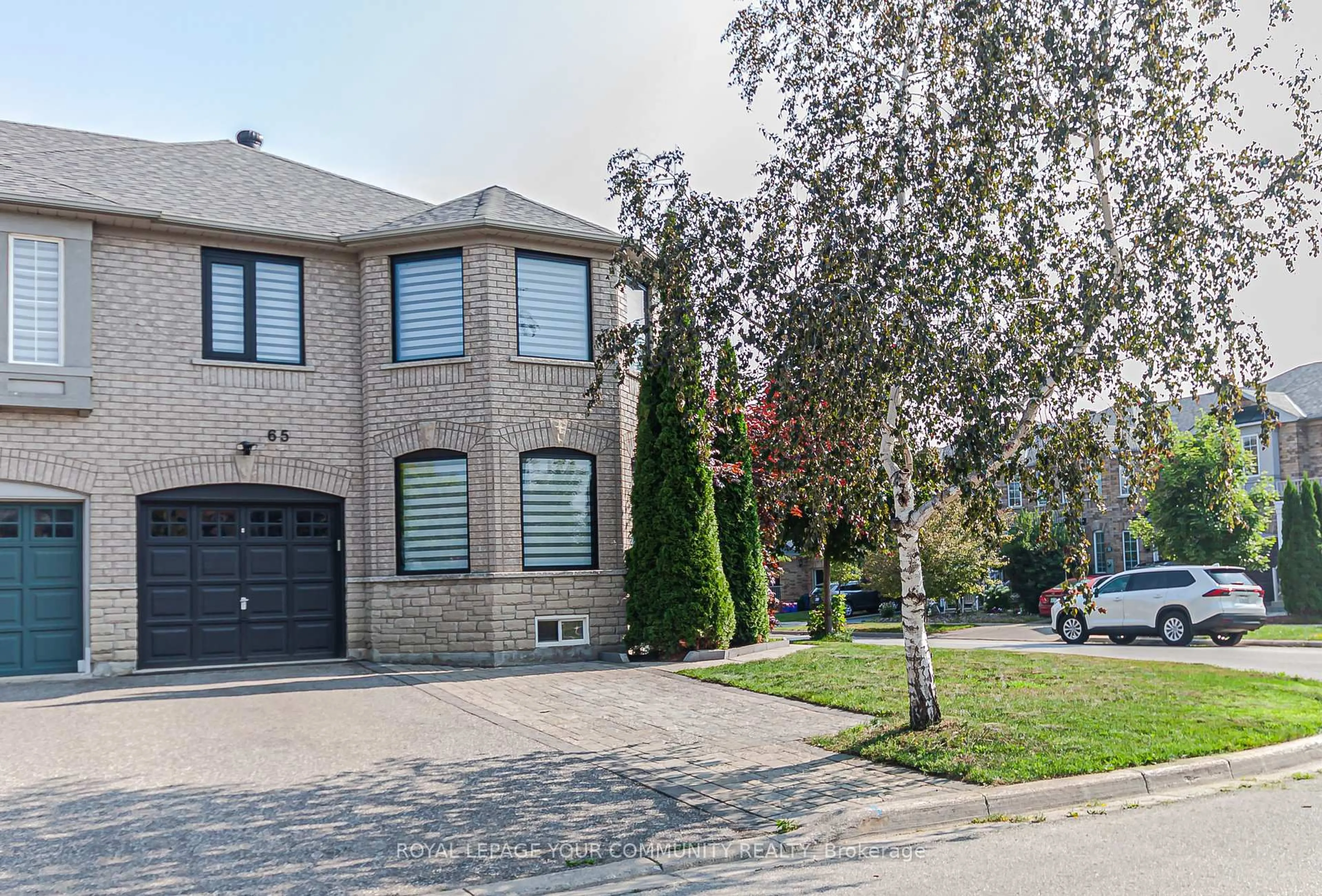 Home with brick exterior material, street for 65 Nahanni Dr, Richmond Hill Ontario L4B 4L4