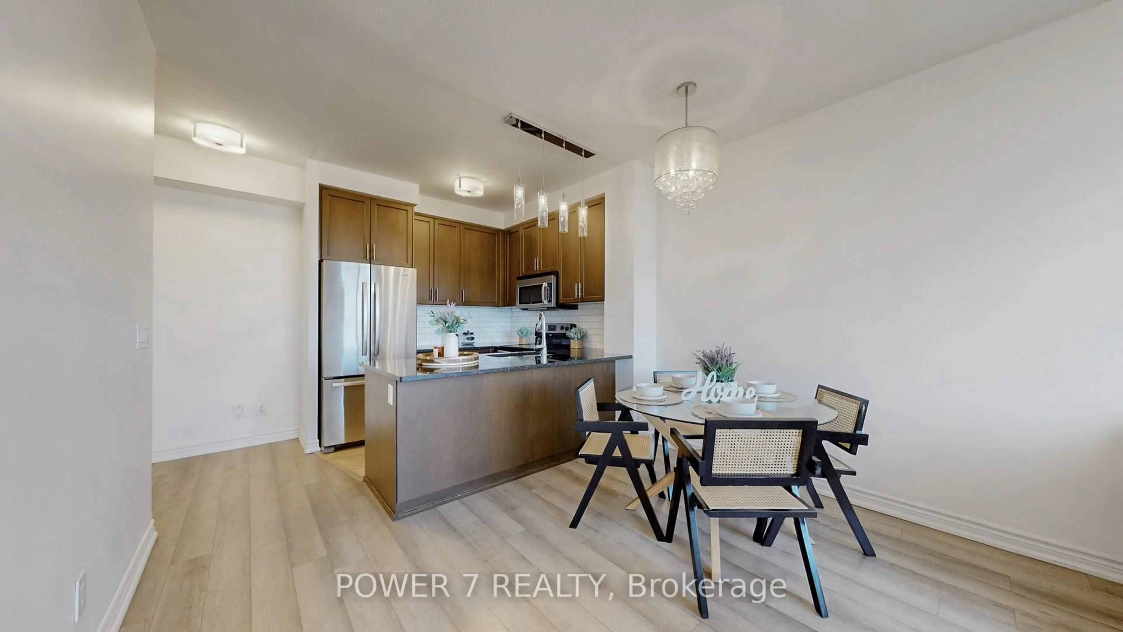 Open concept kitchen, wood/laminate floor for 9245 Jane St #803, Vaughan Ontario L6A 0J9