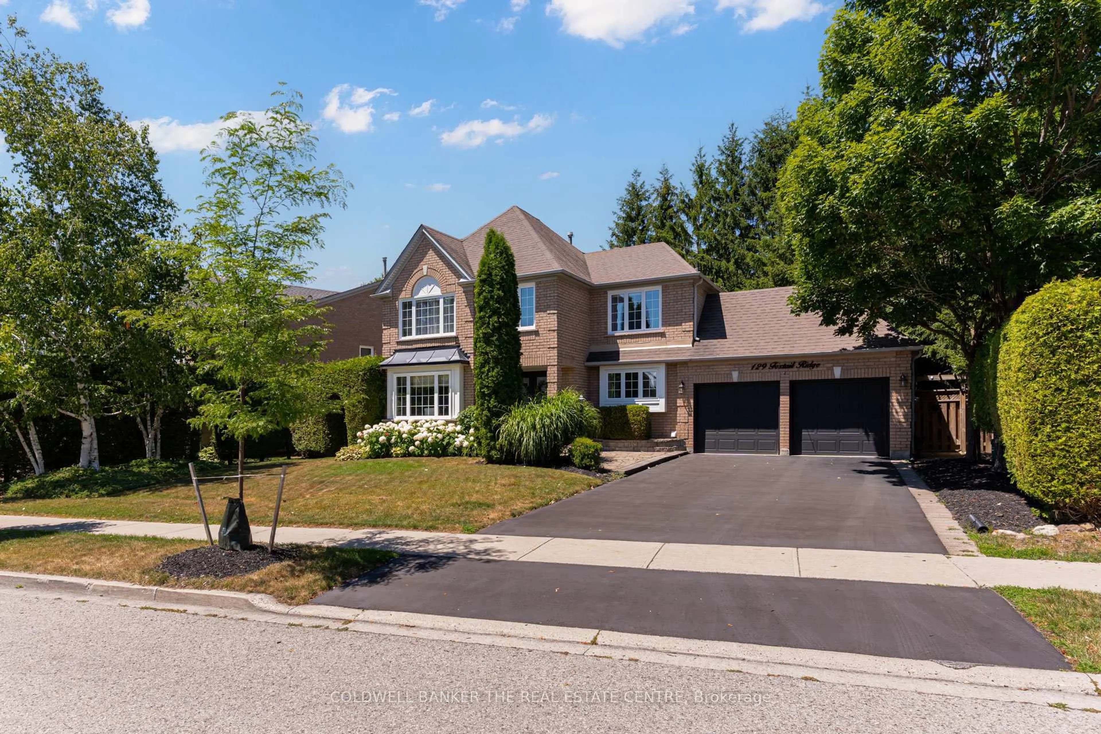 Home with brick exterior material, street for 129 Foxtail Rdge, Newmarket Ontario L3X 1Z2