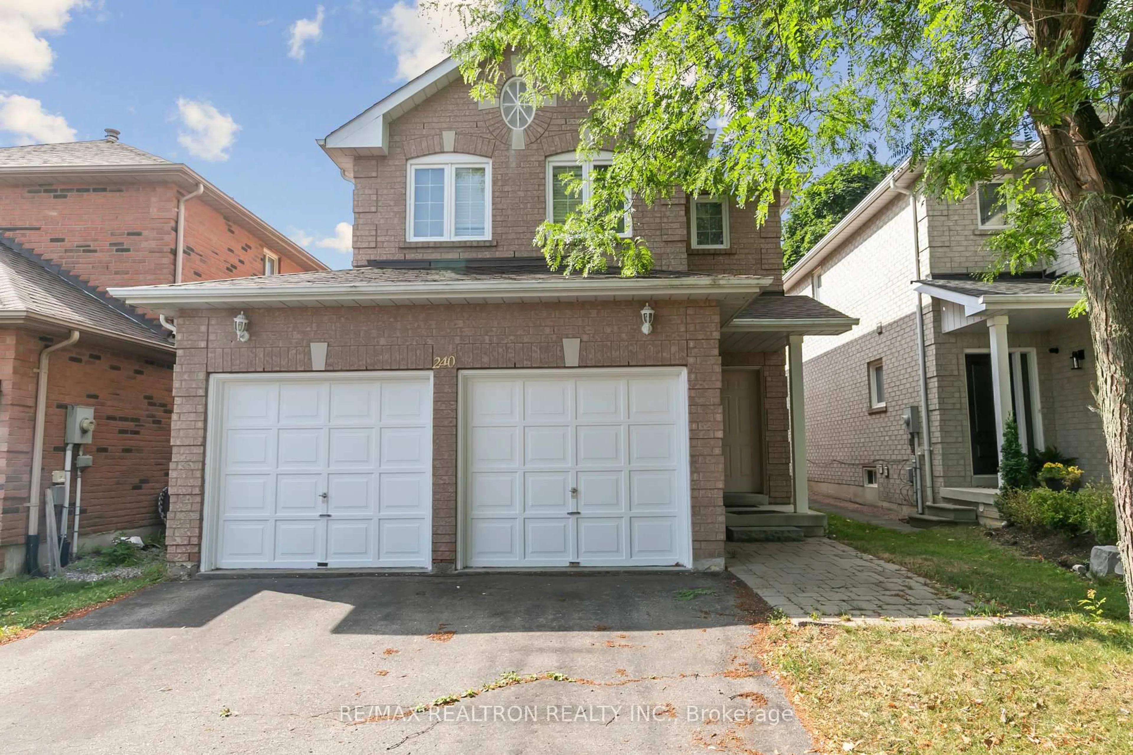 Home with brick exterior material, street for 240 Austinpaul Dr, Newmarket Ontario L3X 2C5