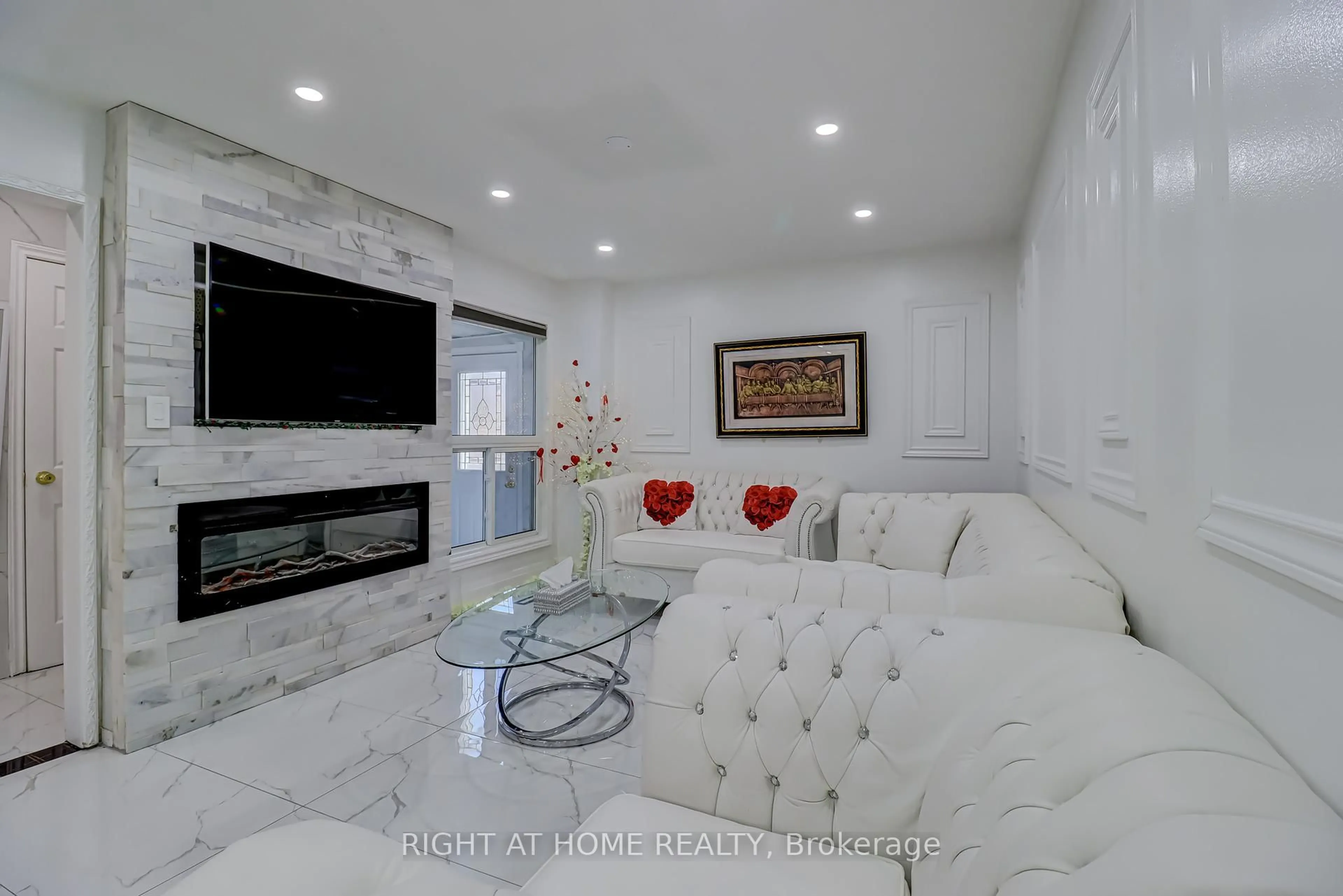Living room with furniture, ceramic/tile floor for 63 Cog Hill Dr, Vaughan Ontario L4K 1M6