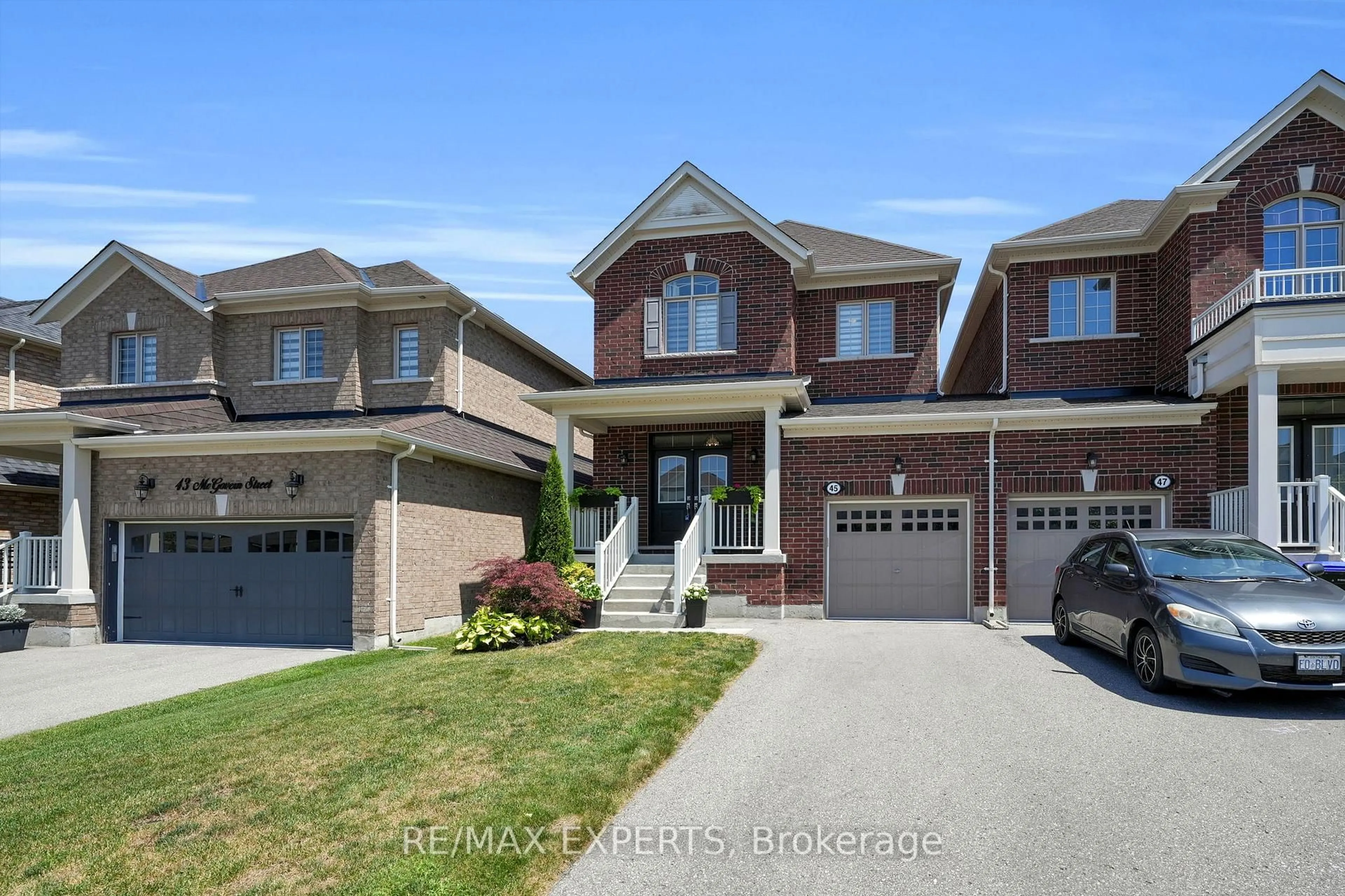 Home with brick exterior material, street for 45 McGovern St, New Tecumseth Ontario L0G 1W0