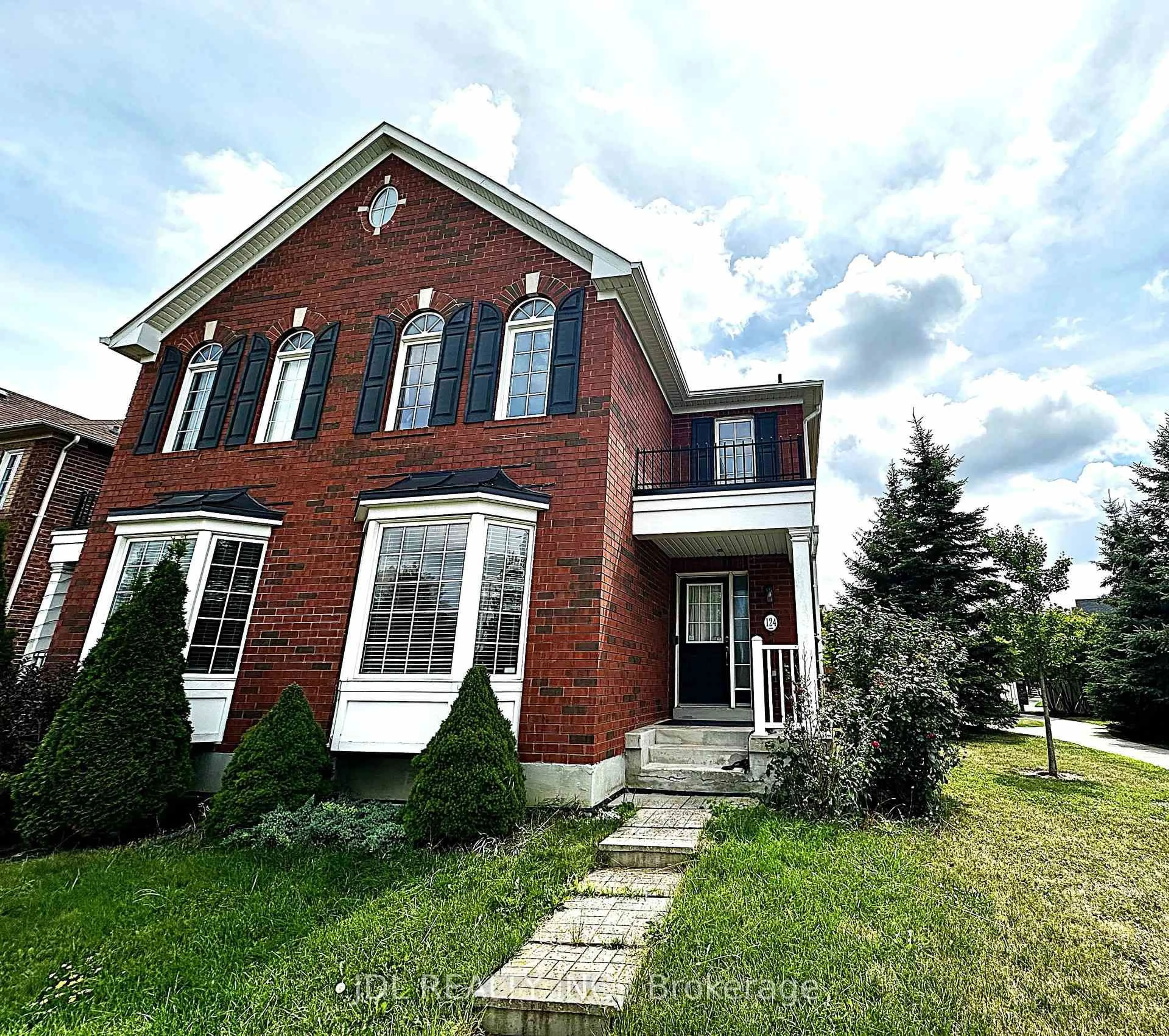 Home with brick exterior material, street for 124 Gas Lamp Lane, Markham Ontario L6B 0H8