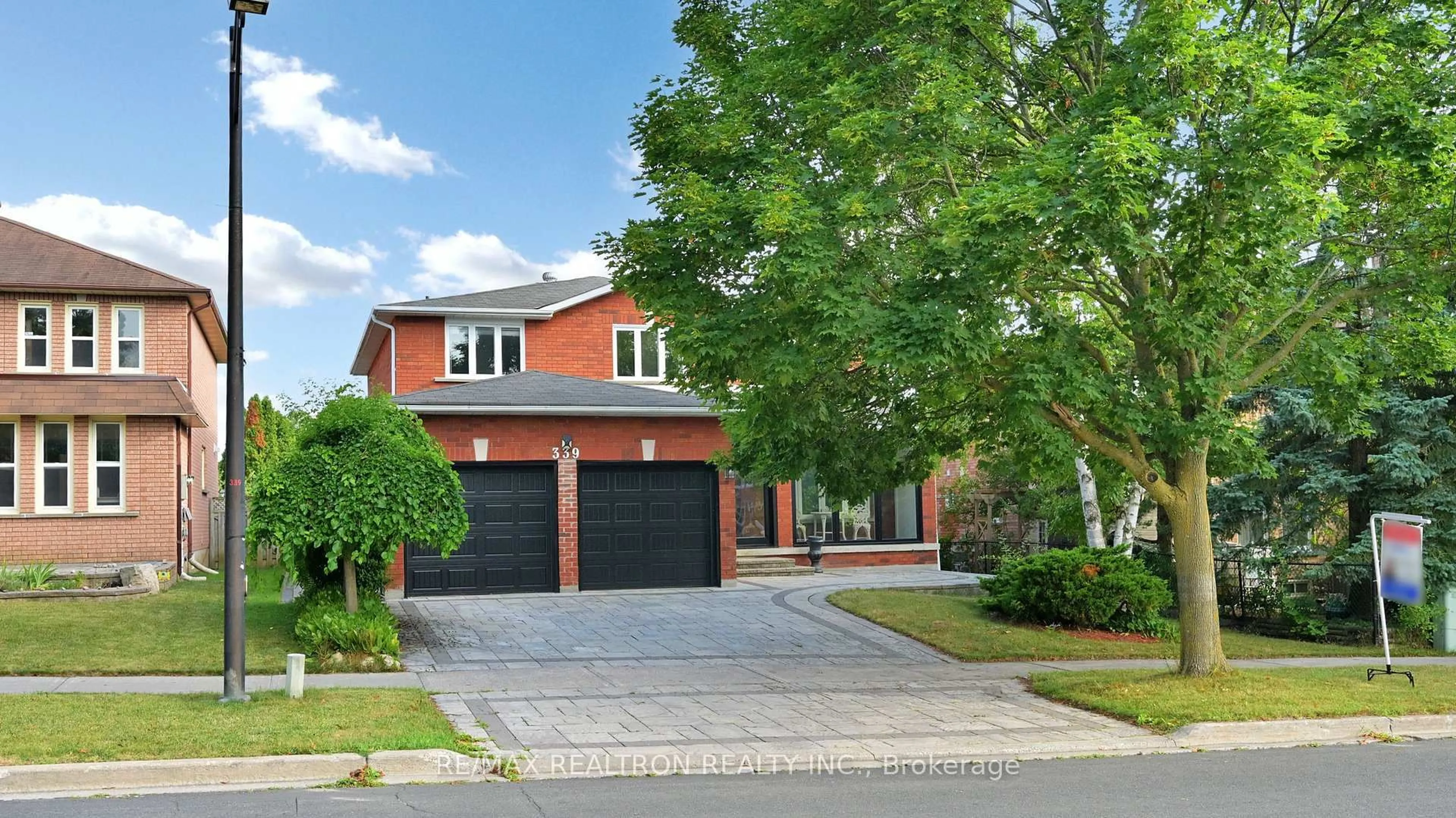 Home with brick exterior material, street for 339 Manhattan Dr, Markham Ontario L3P 7L7
