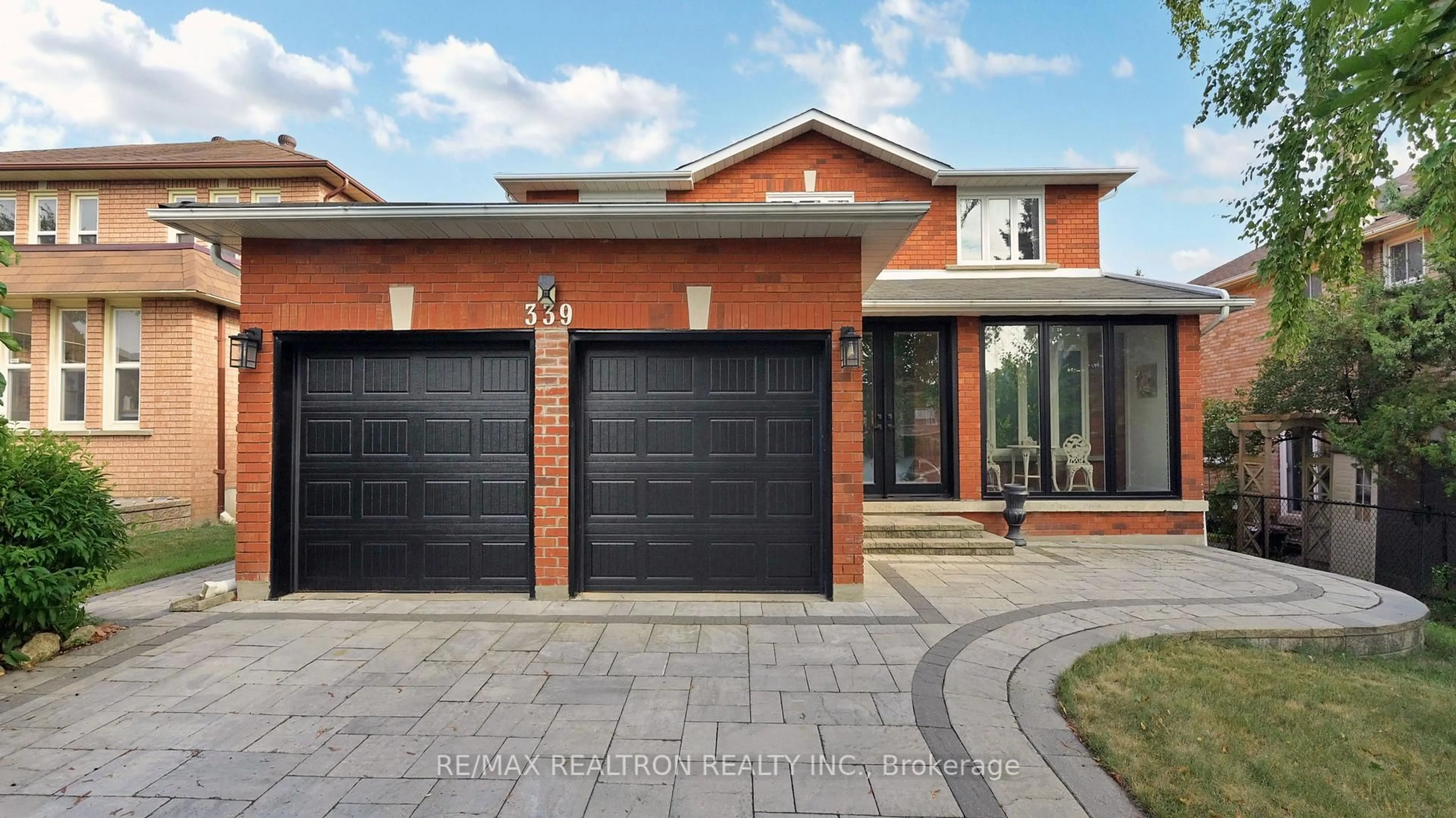 Home with brick exterior material, street for 339 Manhattan Dr, Markham Ontario L3P 7L7