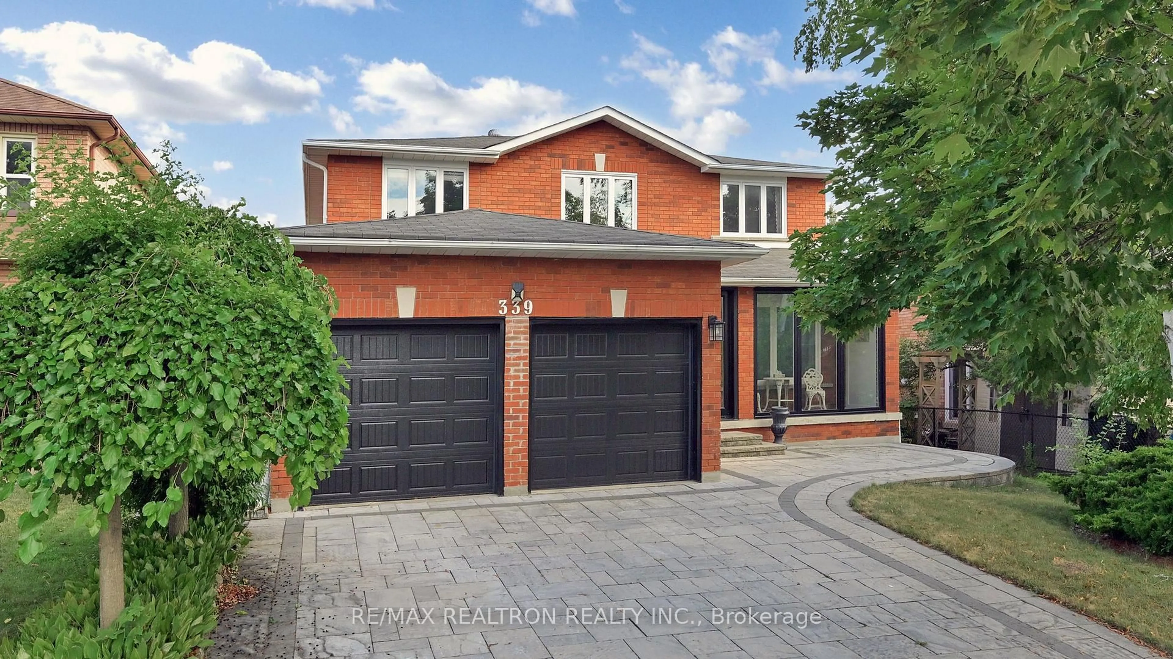 Home with brick exterior material, street for 339 Manhattan Dr, Markham Ontario L3P 7L7