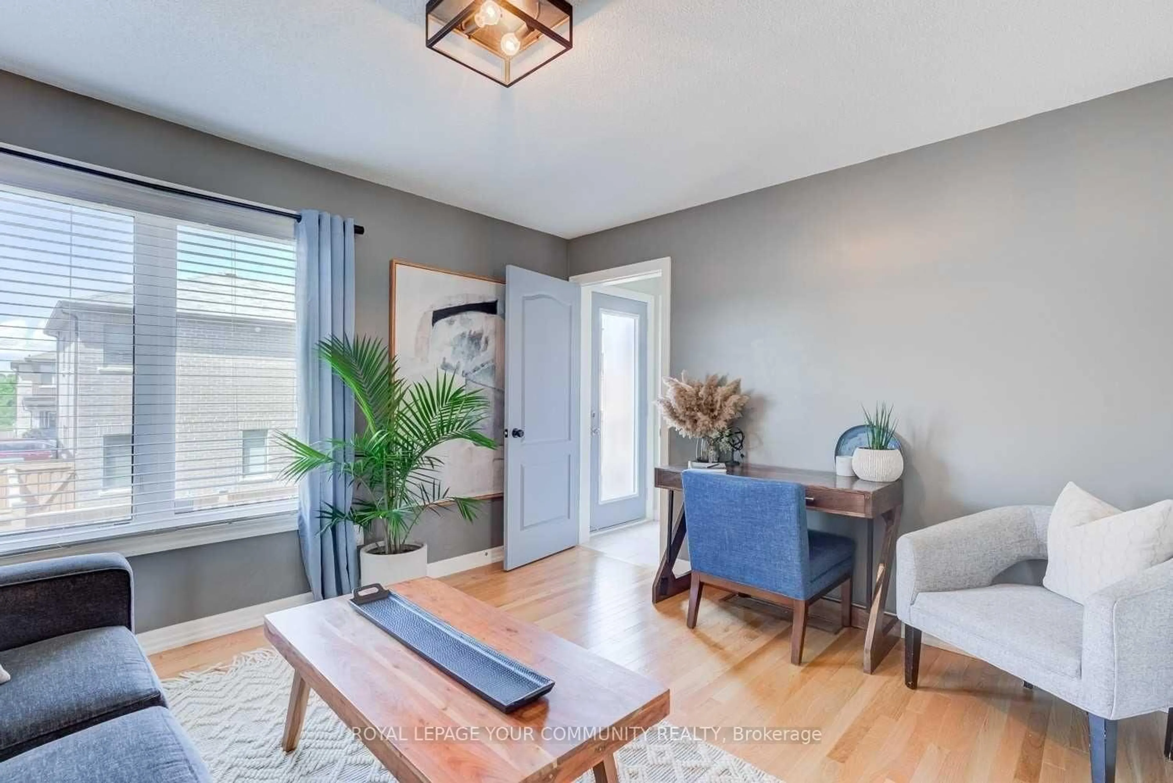 Living room with furniture, wood/laminate floor for 56 Allure St, Newmarket Ontario L3X 0L2