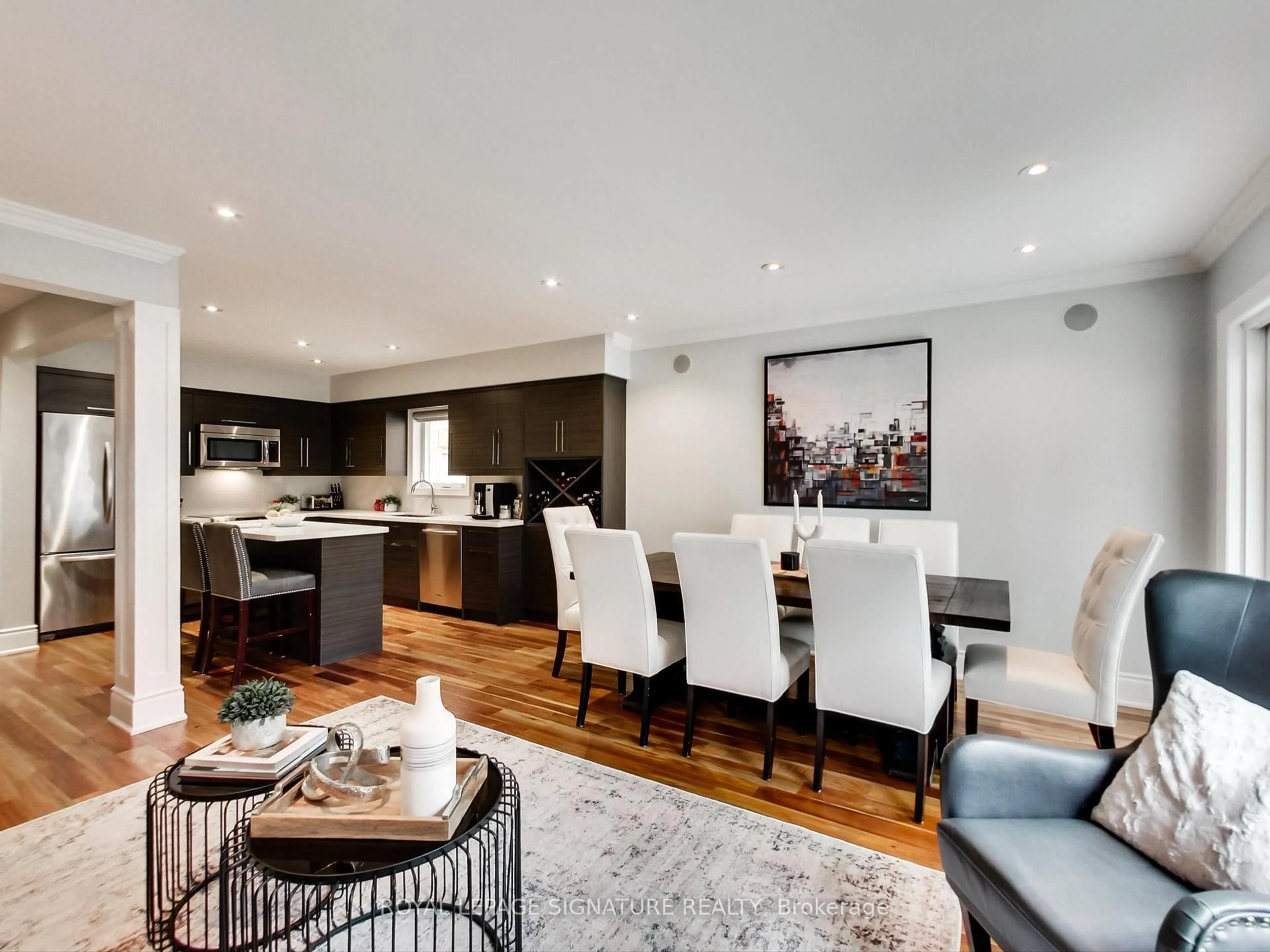 Open concept kitchen, wood/laminate floor for 75 Monte Carlo Dr, Vaughan Ontario L4H 1T3