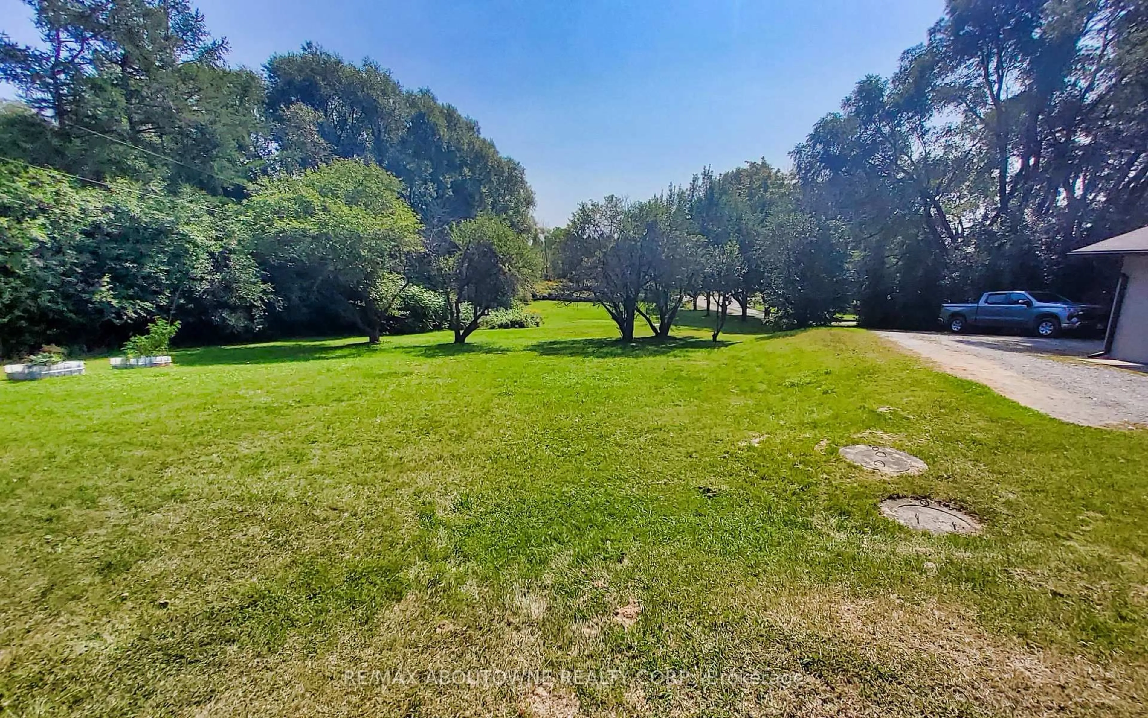 A pic from outside/outdoor area/front of a property/back of a property/a pic from drone, forest/trees view for 2386 4th Line, Innisfil Ontario L0L 1K0