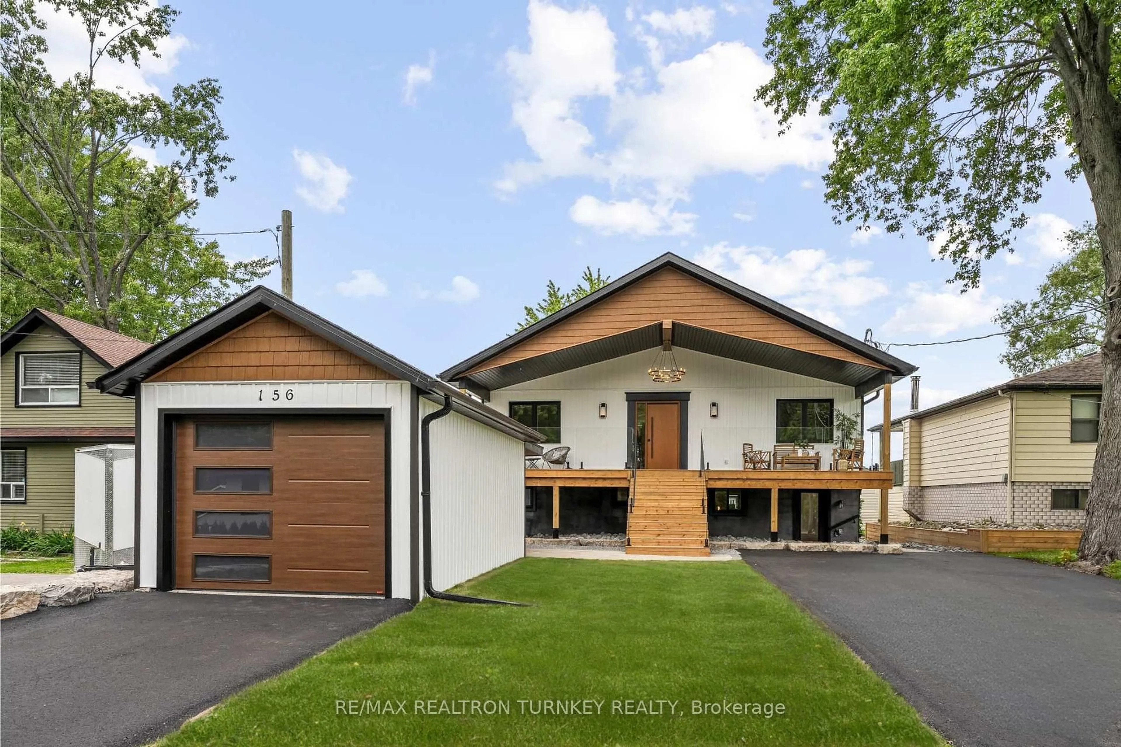 Home with vinyl exterior material, street for 156 Holmes Point Rd, Georgina Ontario L0E 1N0