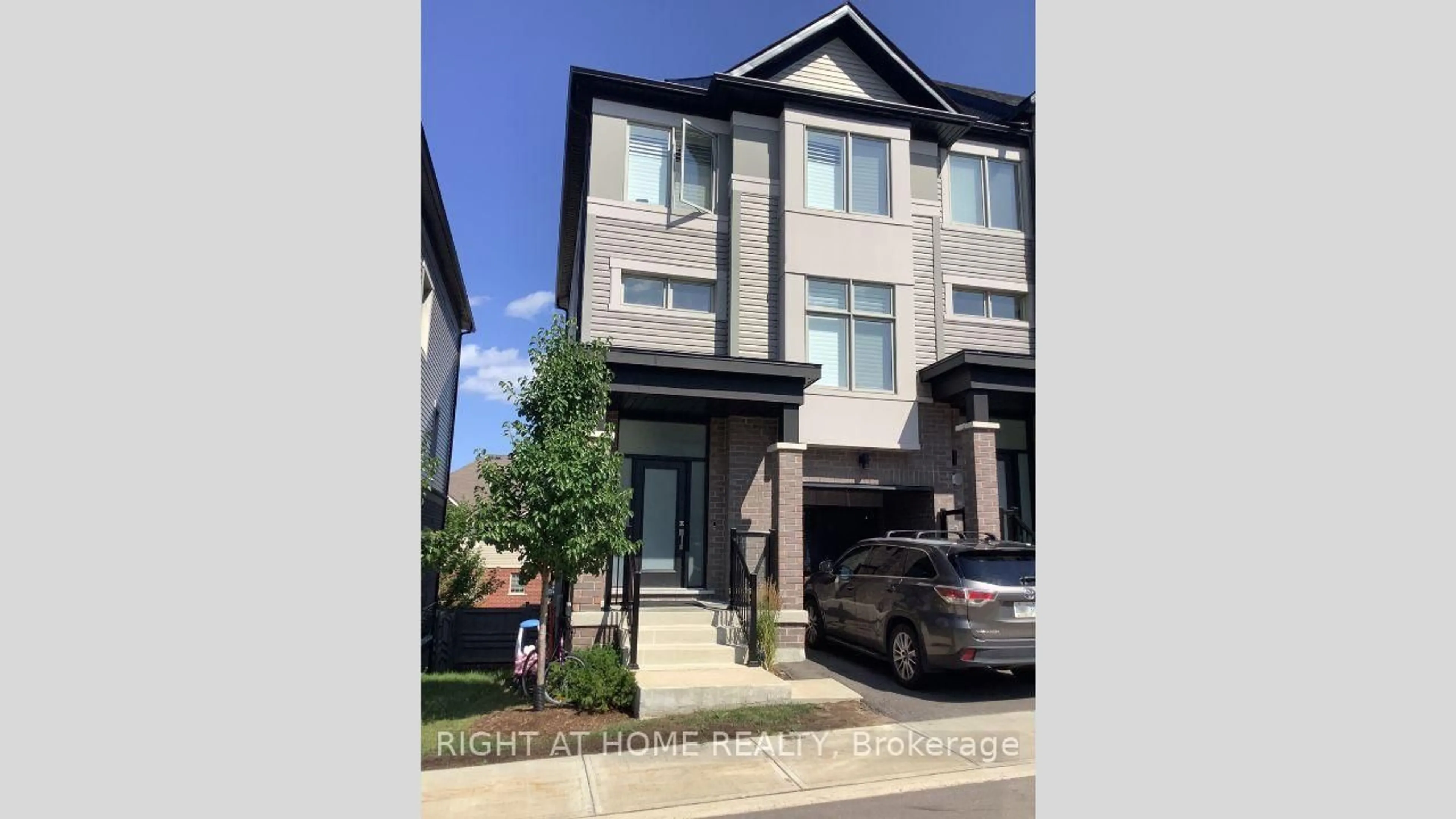 Home with brick exterior material, street for 14 Hughes Lane, New Tecumseth Ontario L0G 1W0