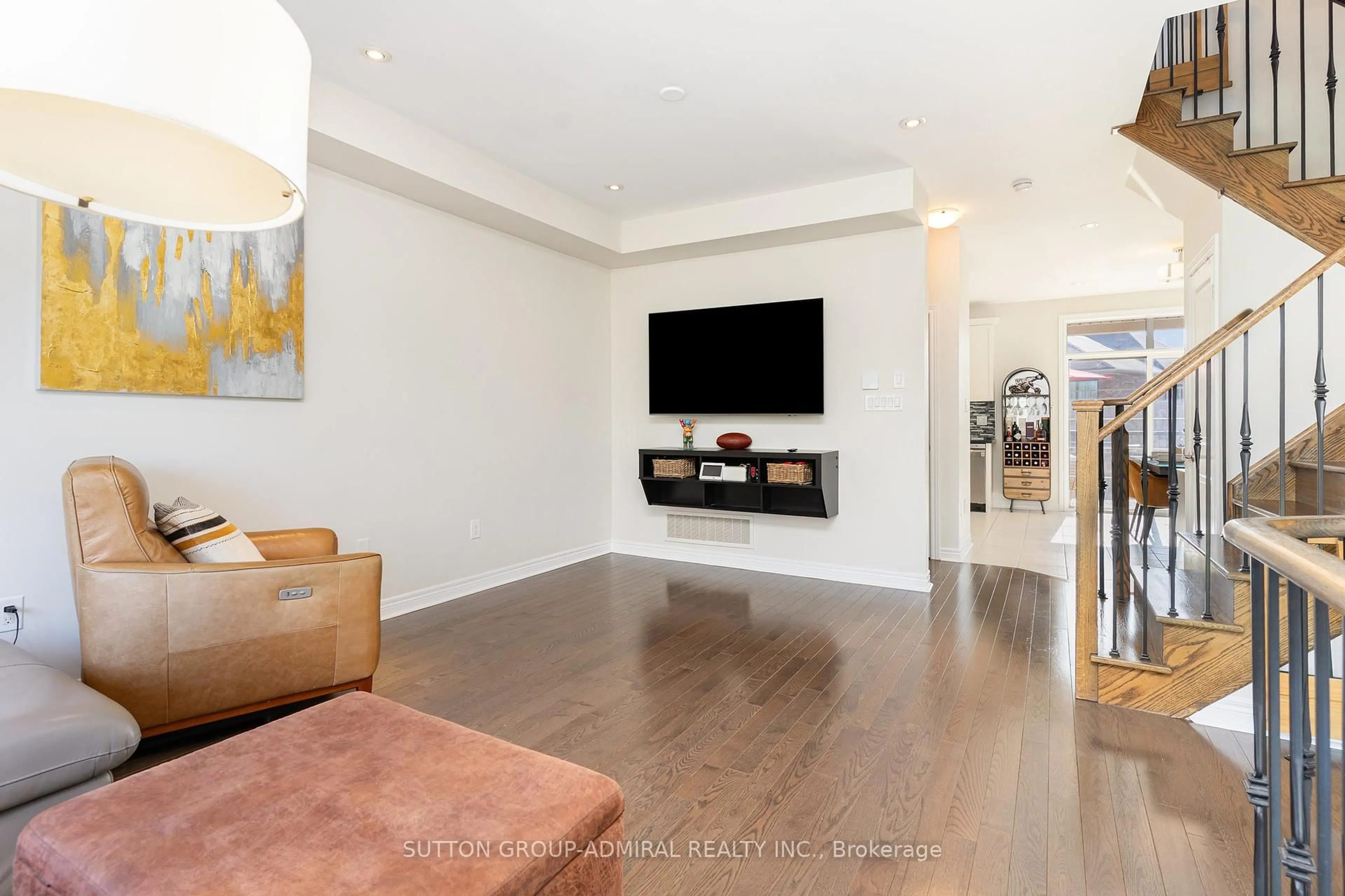 Living room with furniture, wood/laminate floor for 32 Grand Trunk Ave, Vaughan Ontario L6A 0X8