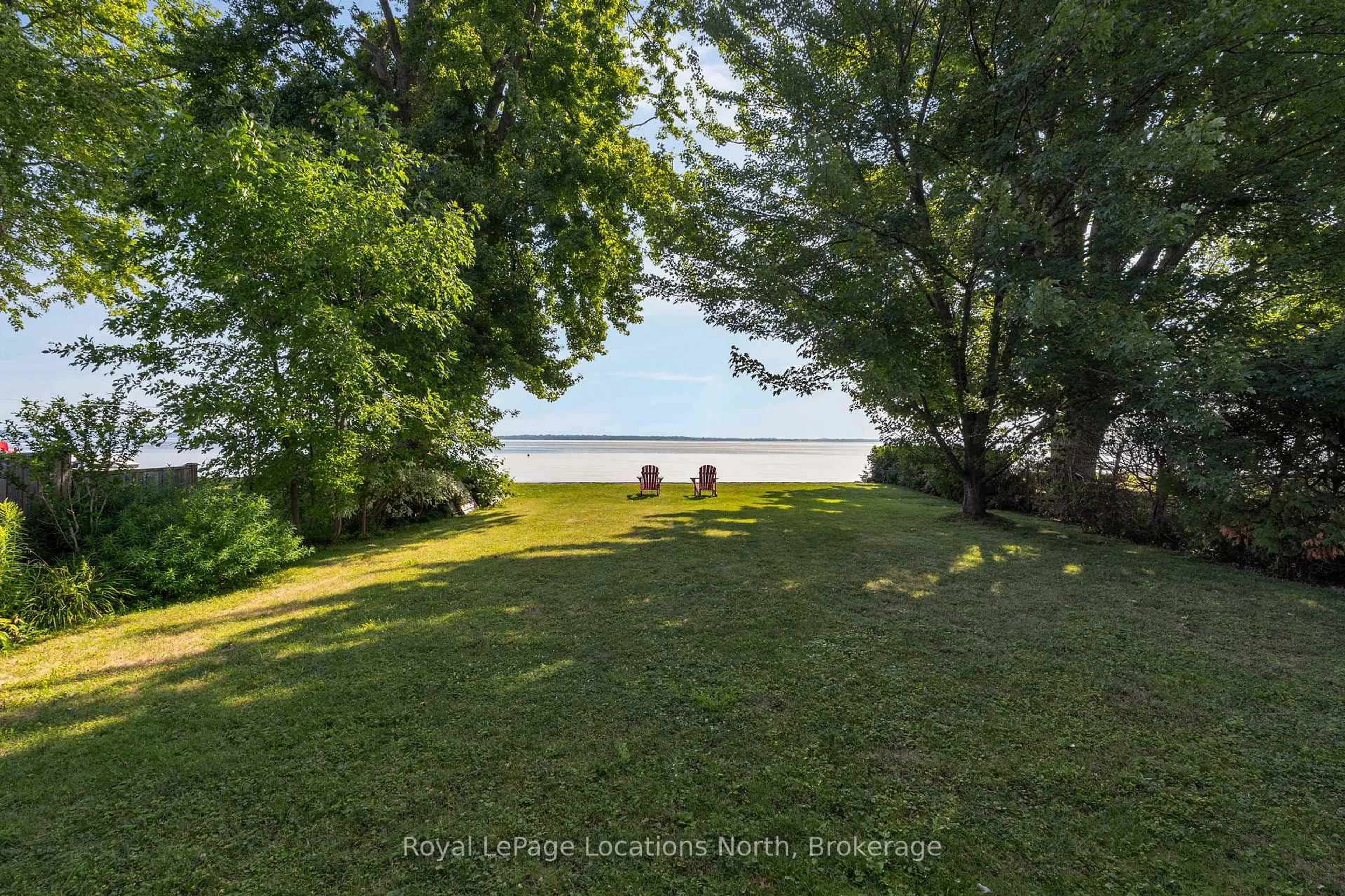 A pic from outside/outdoor area/front of a property/back of a property/a pic from drone, water/lake/river/ocean view for 297 Beach Rd, Innisfil Ontario L0L 1R0