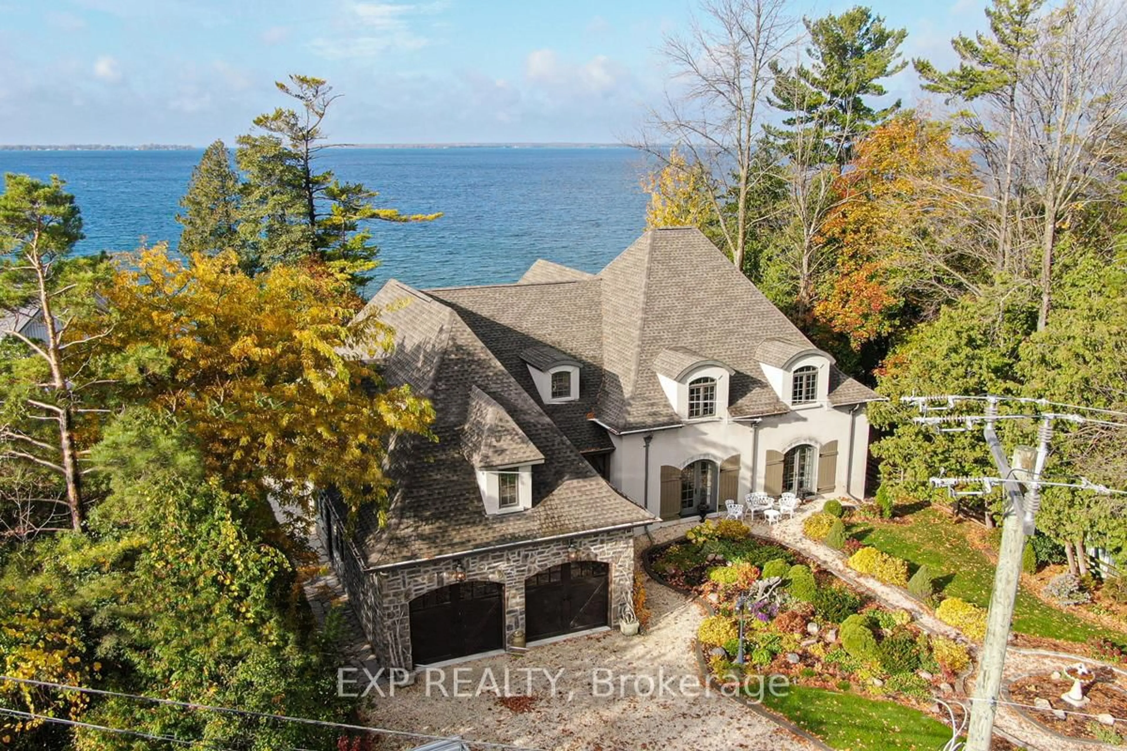 A pic from outside/outdoor area/front of a property/back of a property/a pic from drone, water/lake/river/ocean view for 24960 Thorah Park Blvd, Brock Ontario L0K 1A0