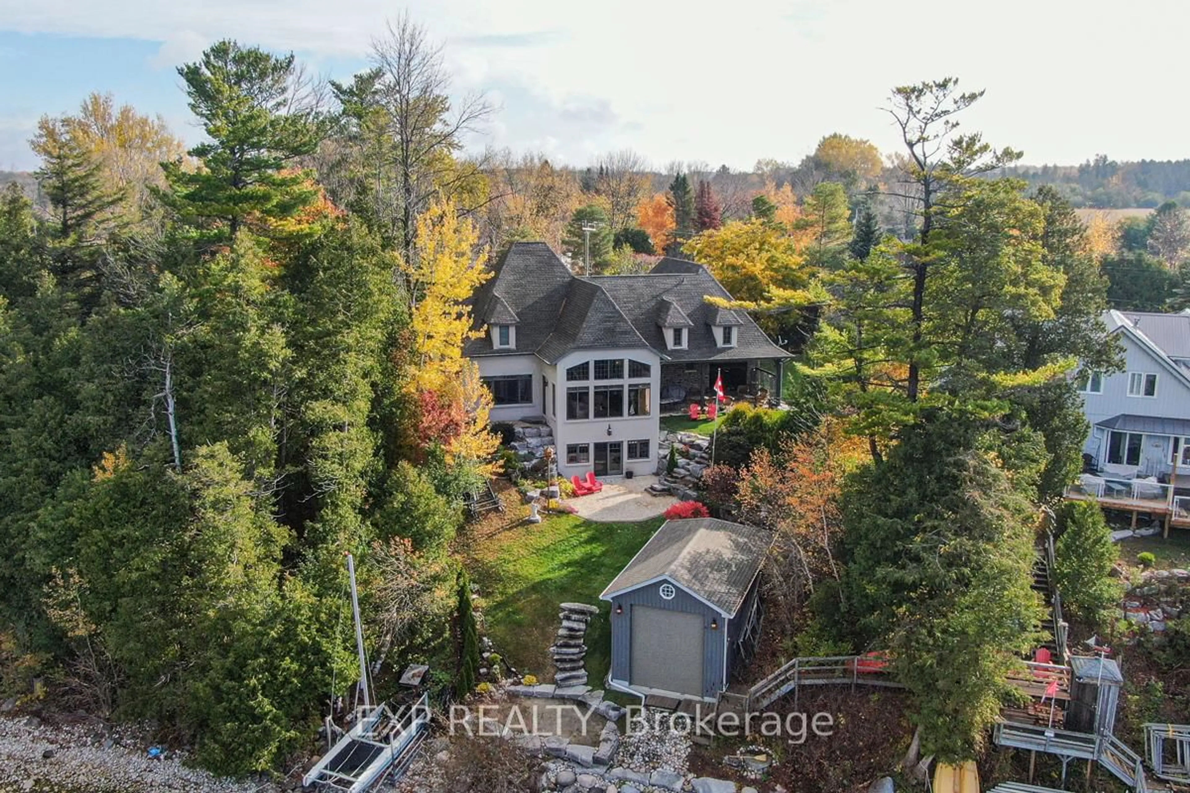 A pic from outside/outdoor area/front of a property/back of a property/a pic from drone, unknown for 24960 Thorah Park Blvd, Brock Ontario L0K 1A0