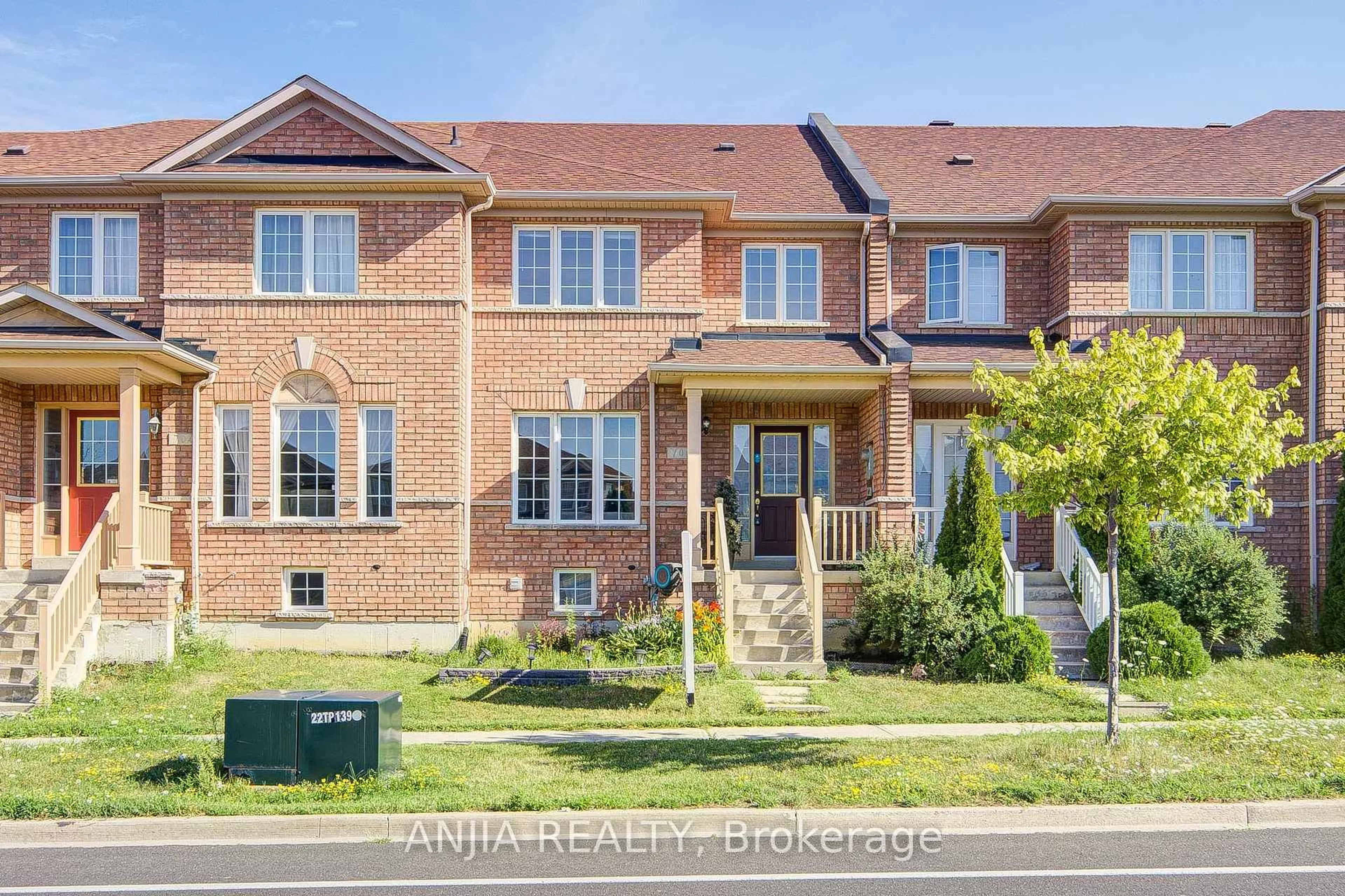 Home with brick exterior material, street for 706 Castlemore Ave, Markham Ontario L6E 1M9