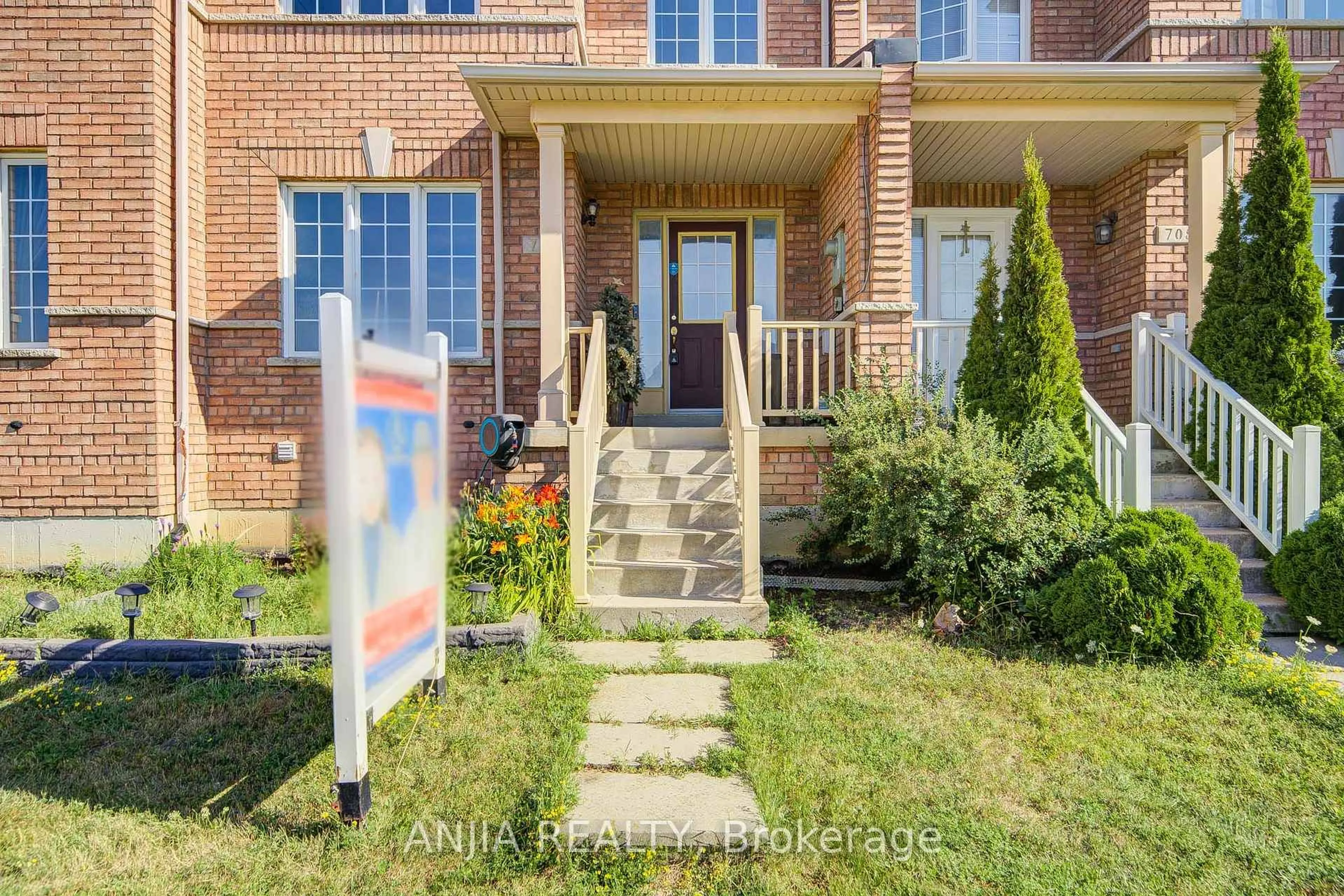 Home with brick exterior material, street for 706 Castlemore Ave, Markham Ontario L6E 1M9