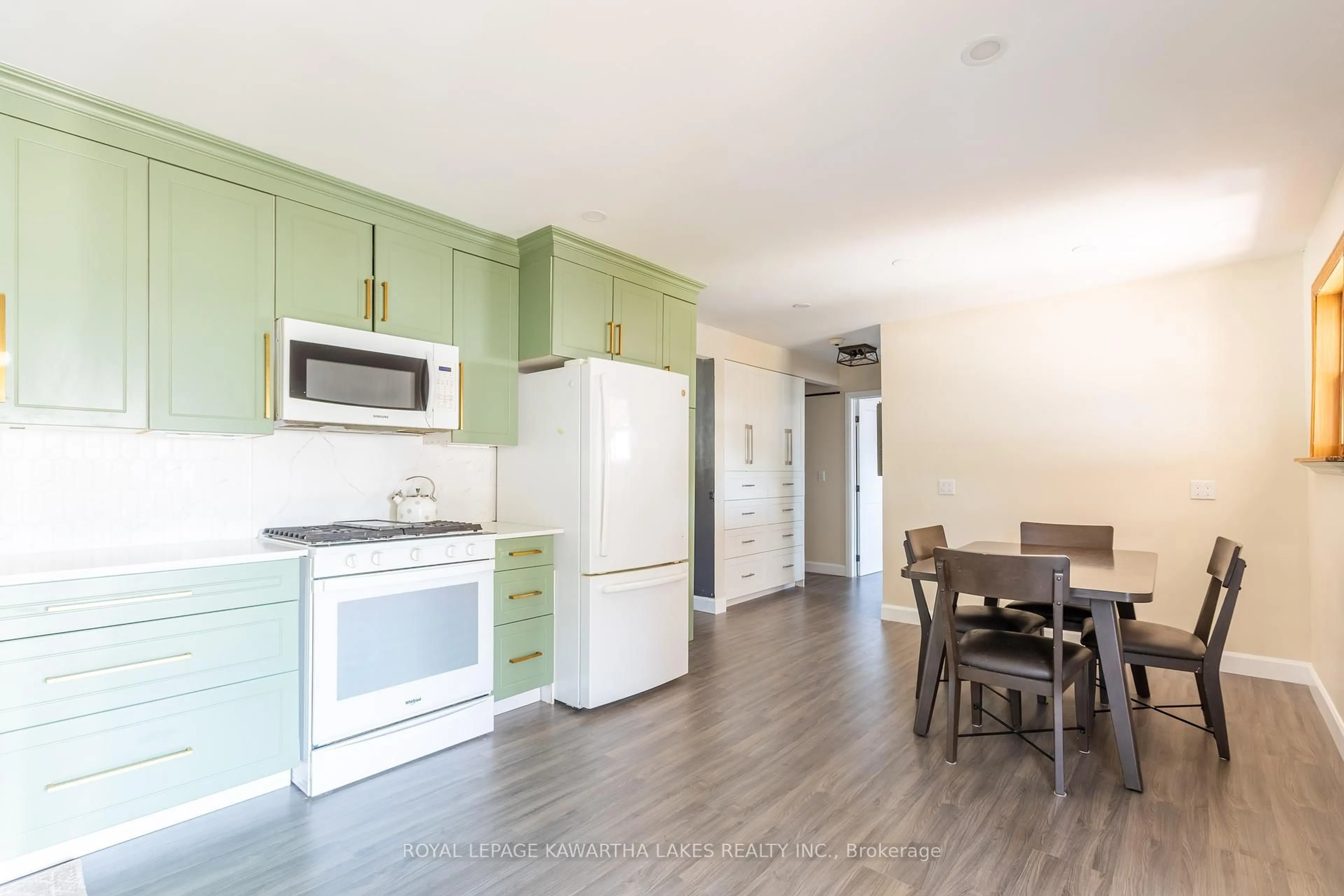 Open concept kitchen, wood/laminate floor for 446 Dundas St, Brock Ontario L0K 1A0