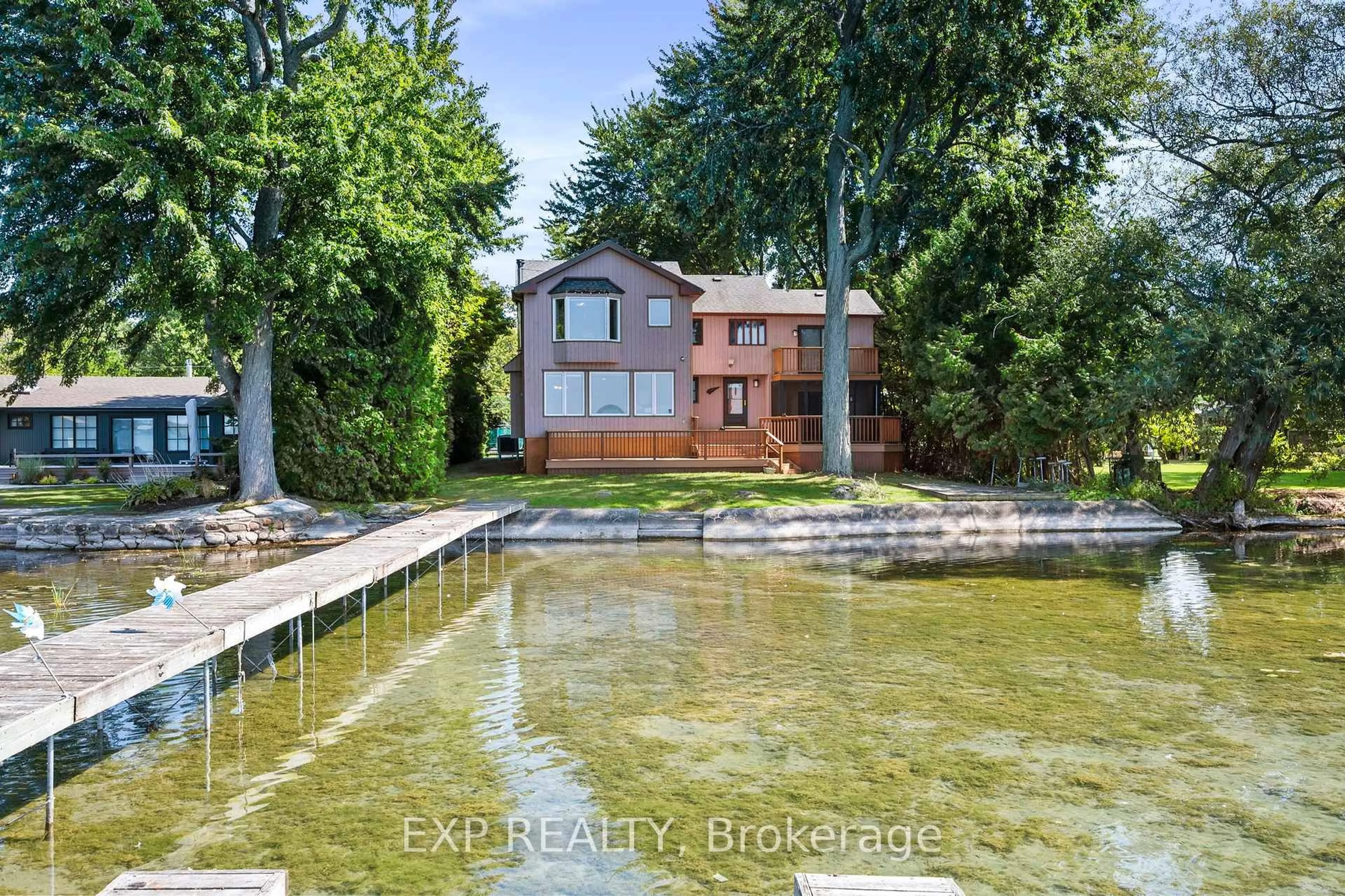 A pic from outside/outdoor area/front of a property/back of a property/a pic from drone, water/lake/river/ocean view for 582 Duclos Point Rd, Georgina Ontario L0E 1N0