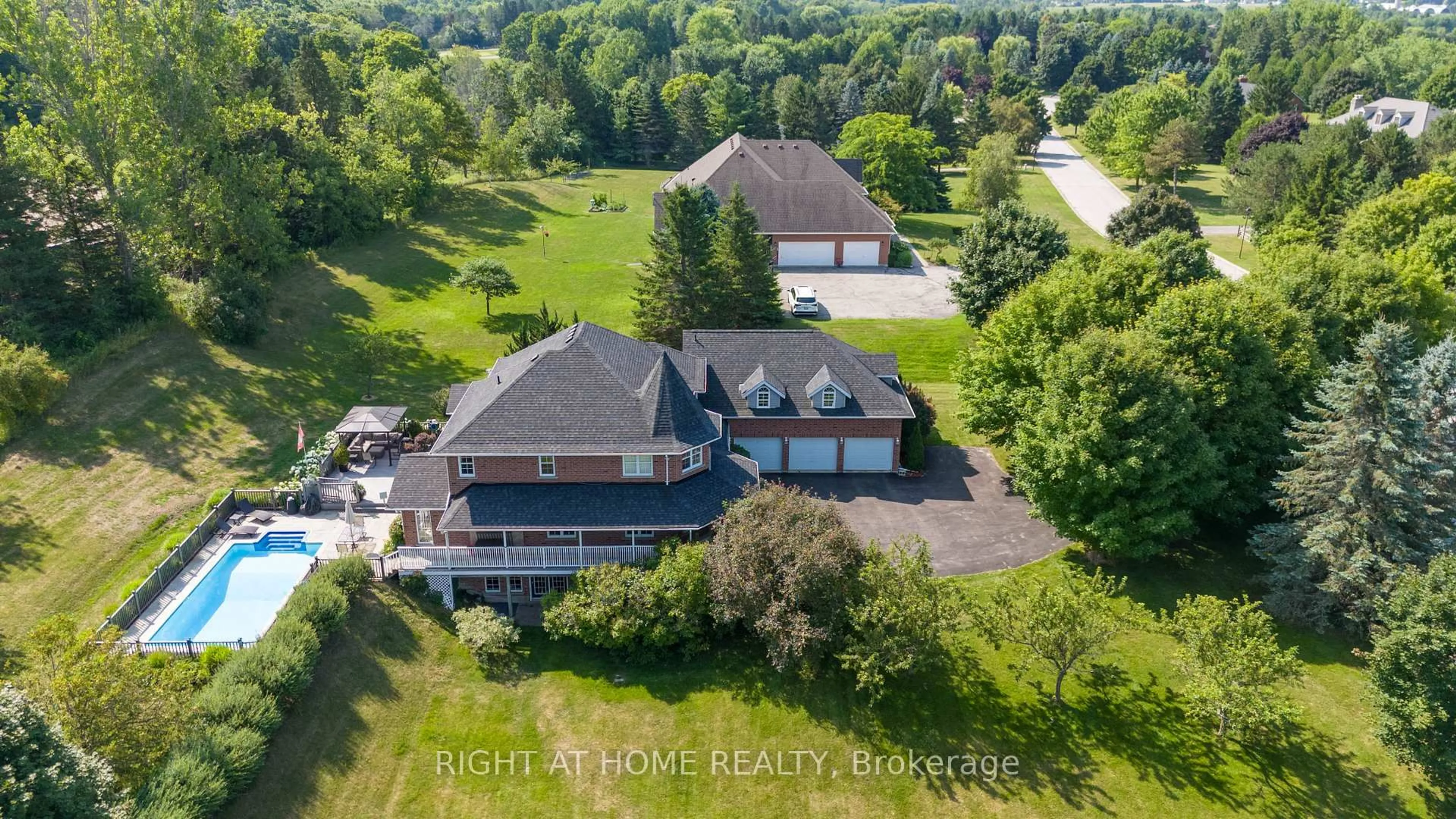 A pic from outside/outdoor area/front of a property/back of a property/a pic from drone, water/lake/river/ocean view for 11 Trainor Crt, King Ontario L0G 1N0