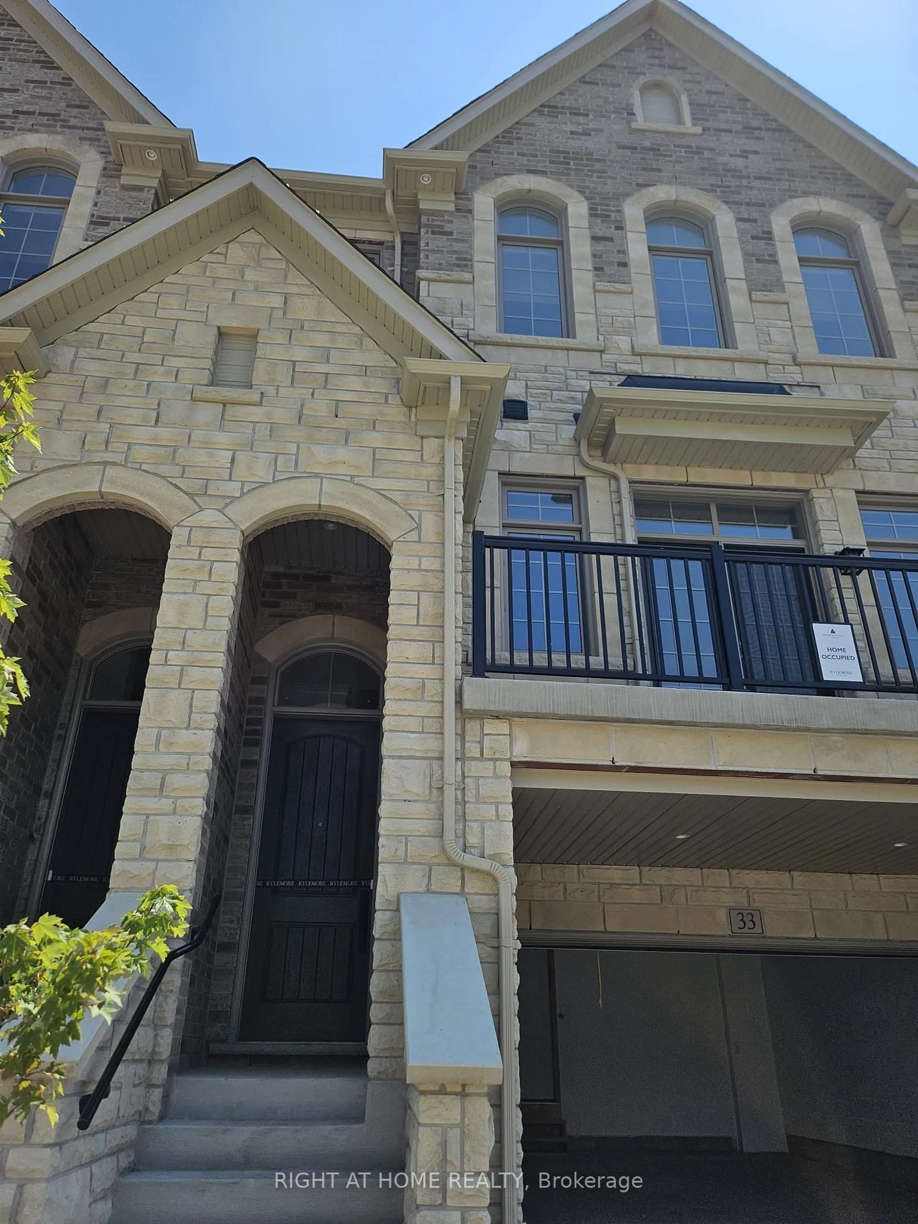 Home with brick exterior material, street for 33 West Village Lane, Markham Ontario L6C 3L5