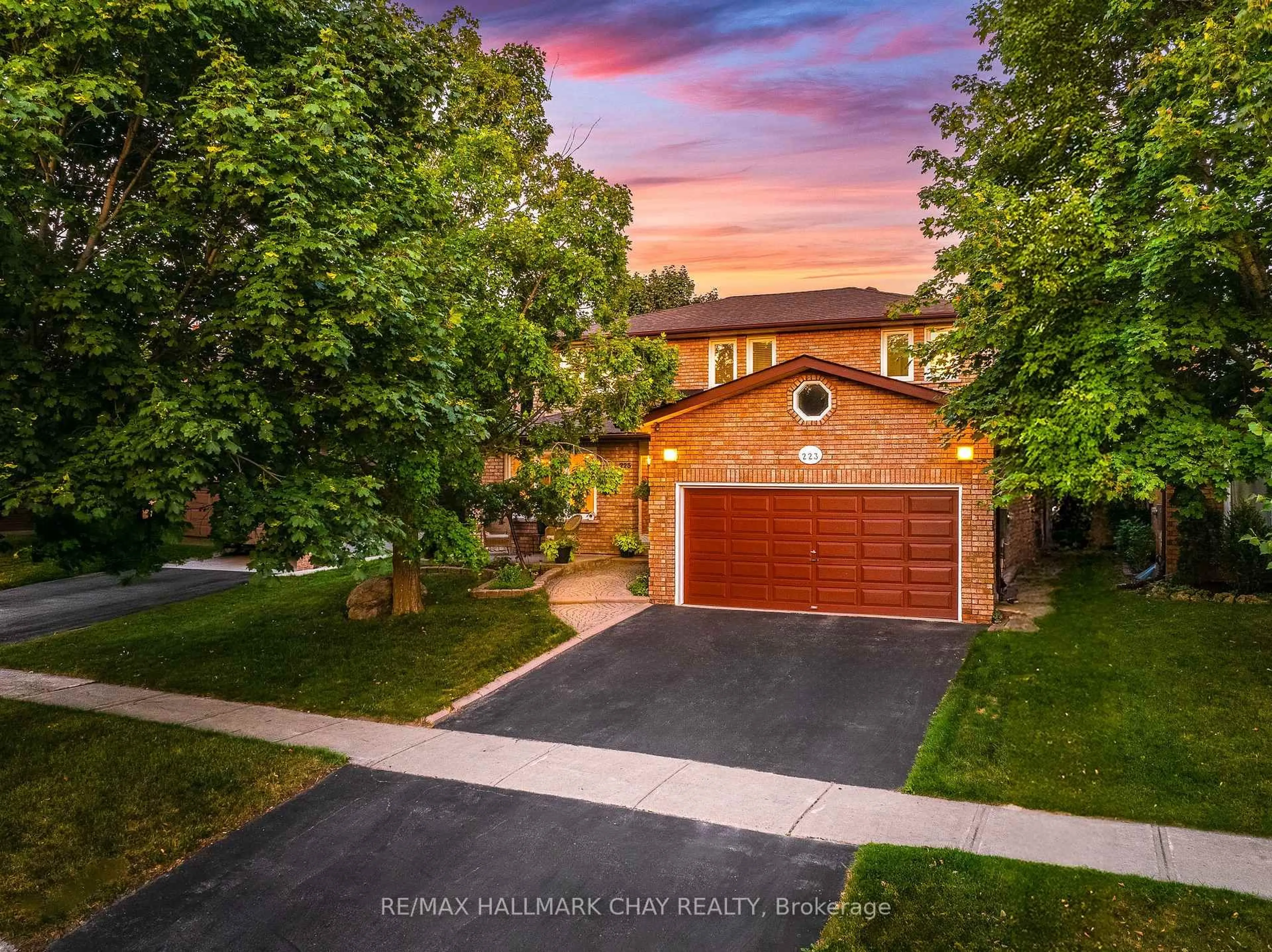 Home with brick exterior material, street for 223 Miller Park Ave, Bradford West Gwillimbury Ontario L3Z 2K2