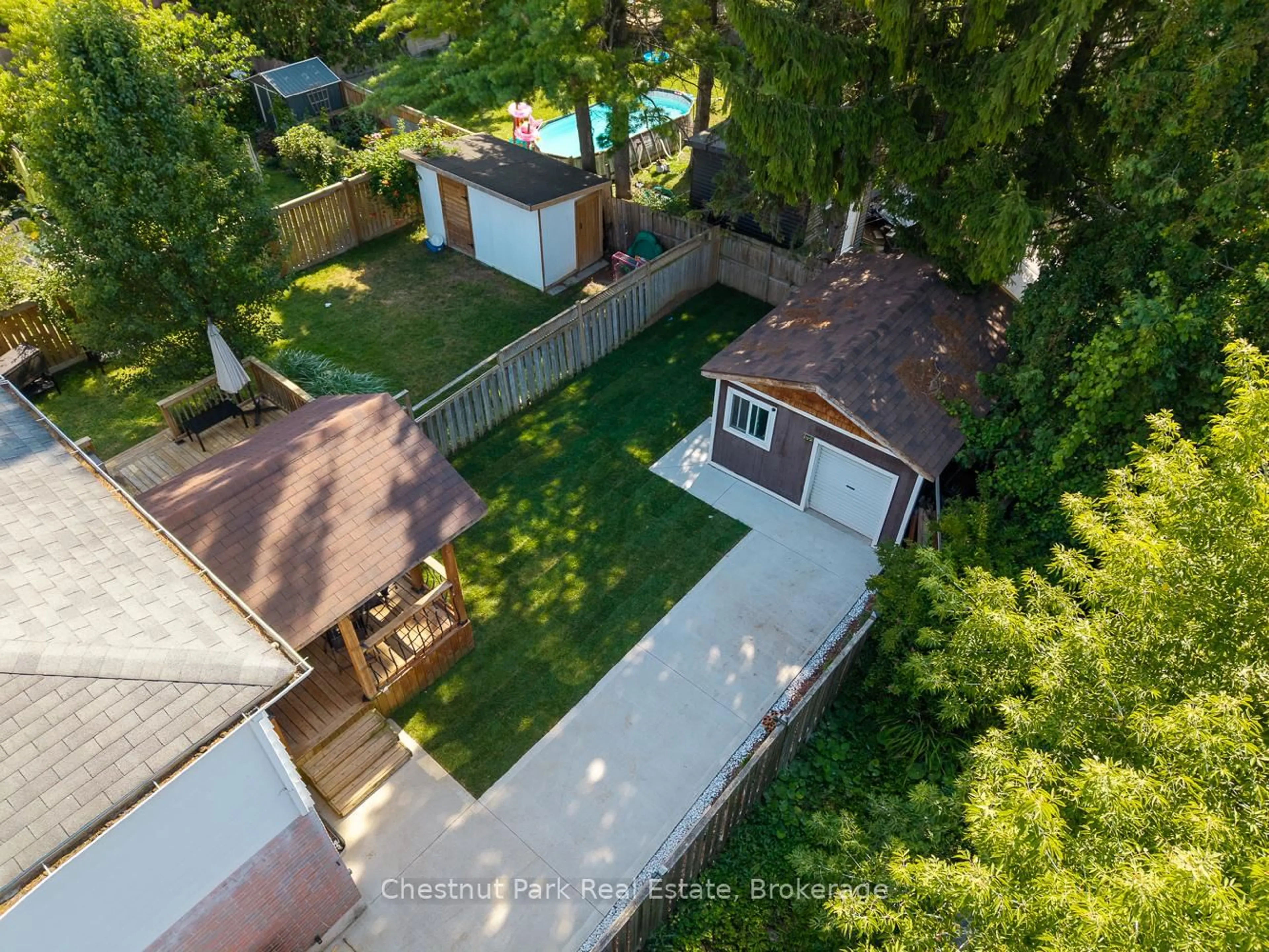 A pic from outside/outdoor area/front of a property/back of a property/a pic from drone, street for 50 Stewart Ave, New Tecumseth Ontario L9R 1C2