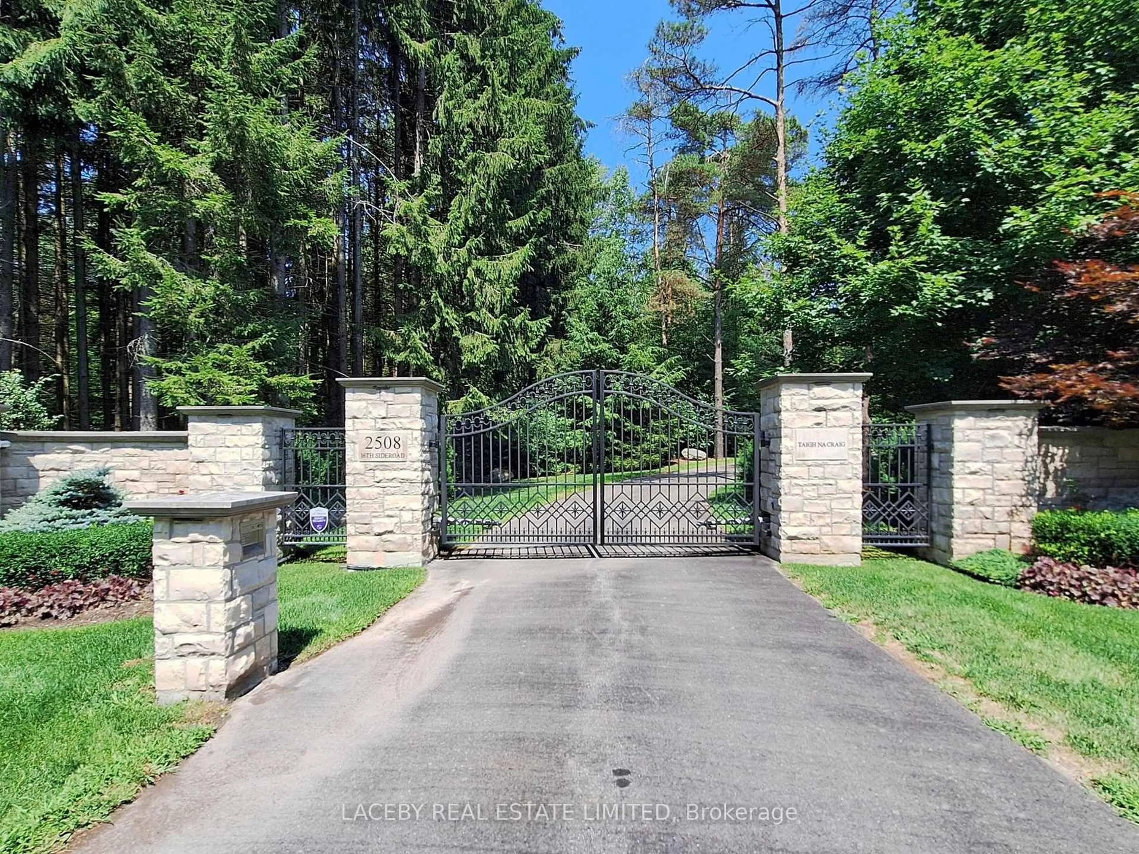 A pic from outside/outdoor area/front of a property/back of a property/a pic from drone, forest/trees view for 2508 16th Sdrd, King Ontario L7B 1A3