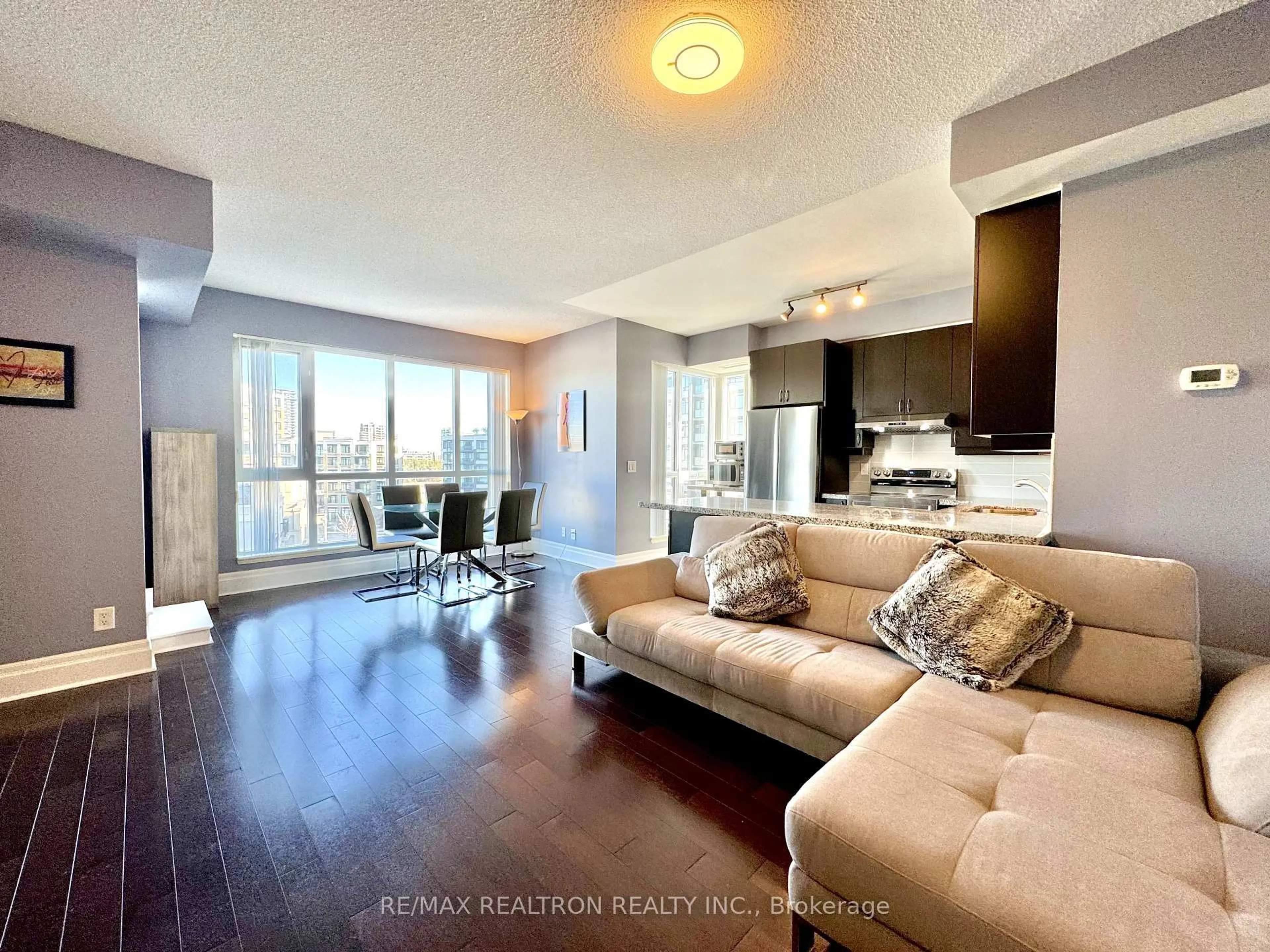 Living room with furniture, unknown for 57 Upper Duke Cres #505, Markham Ontario L6G 0B9