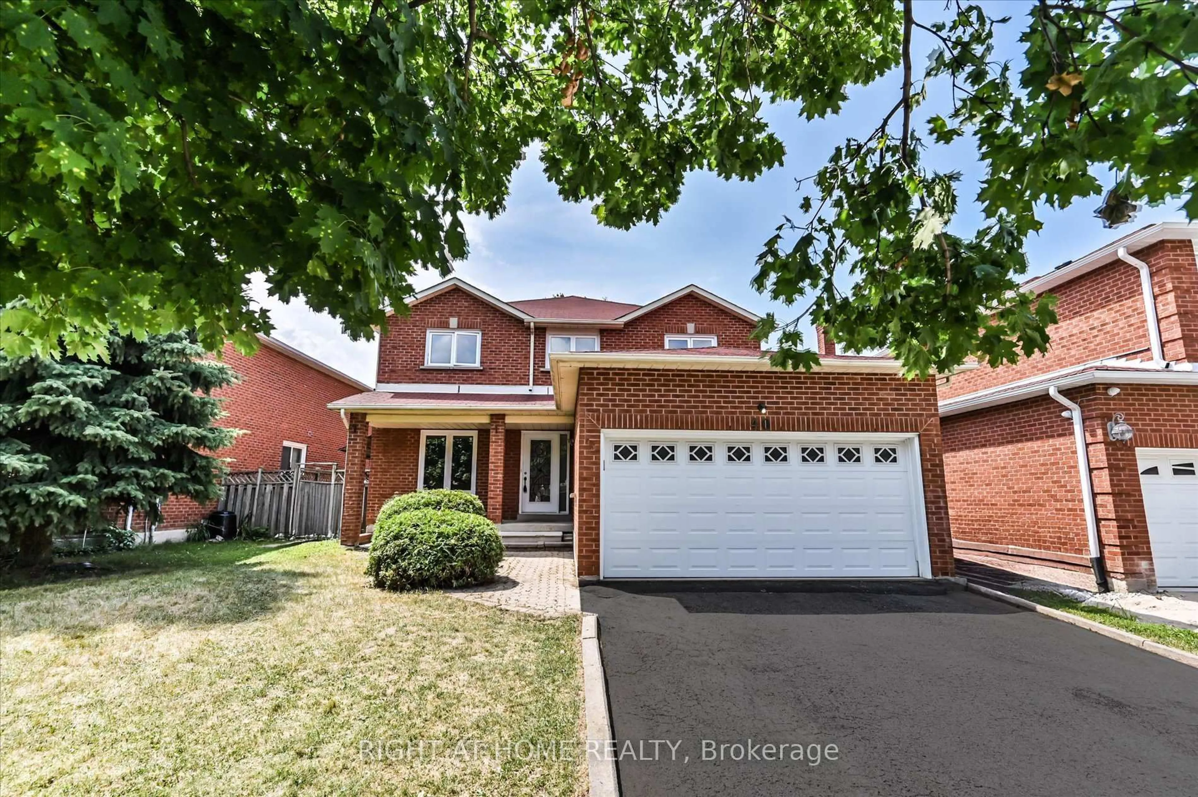 Home with brick exterior material, street for 40 Norman Ross Dr, Markham Ontario L3S 2Z2