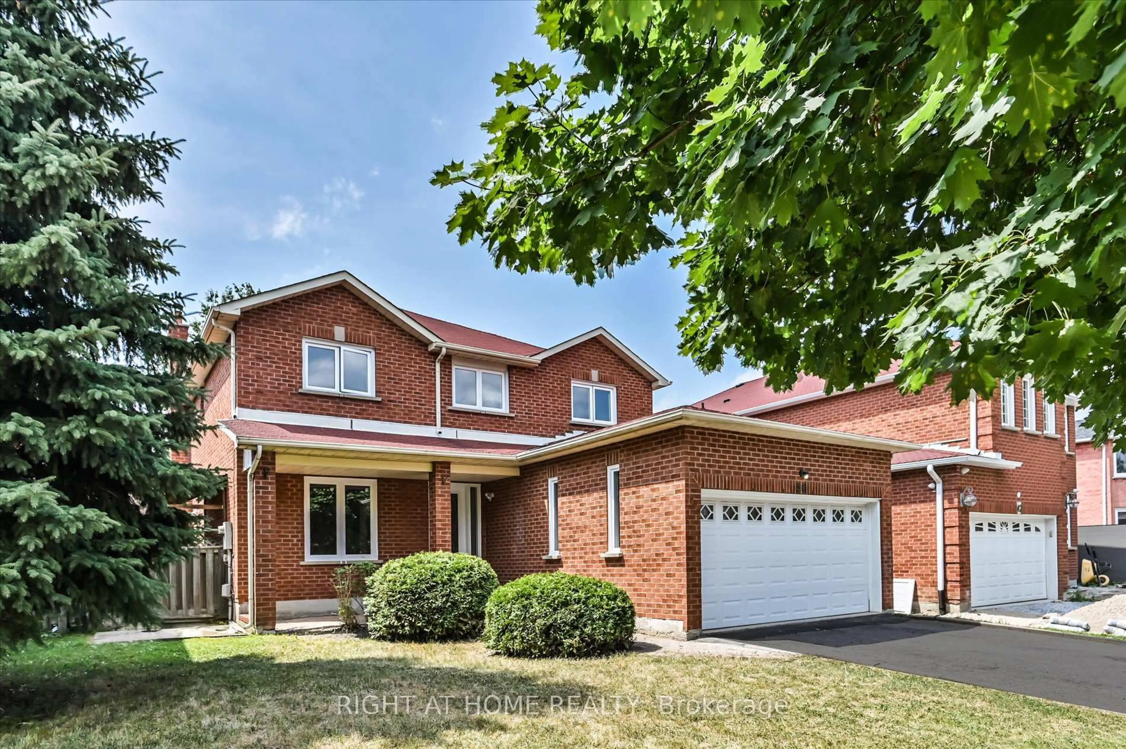 Home with brick exterior material, street for 40 Norman Ross Dr, Markham Ontario L3S 2Z2