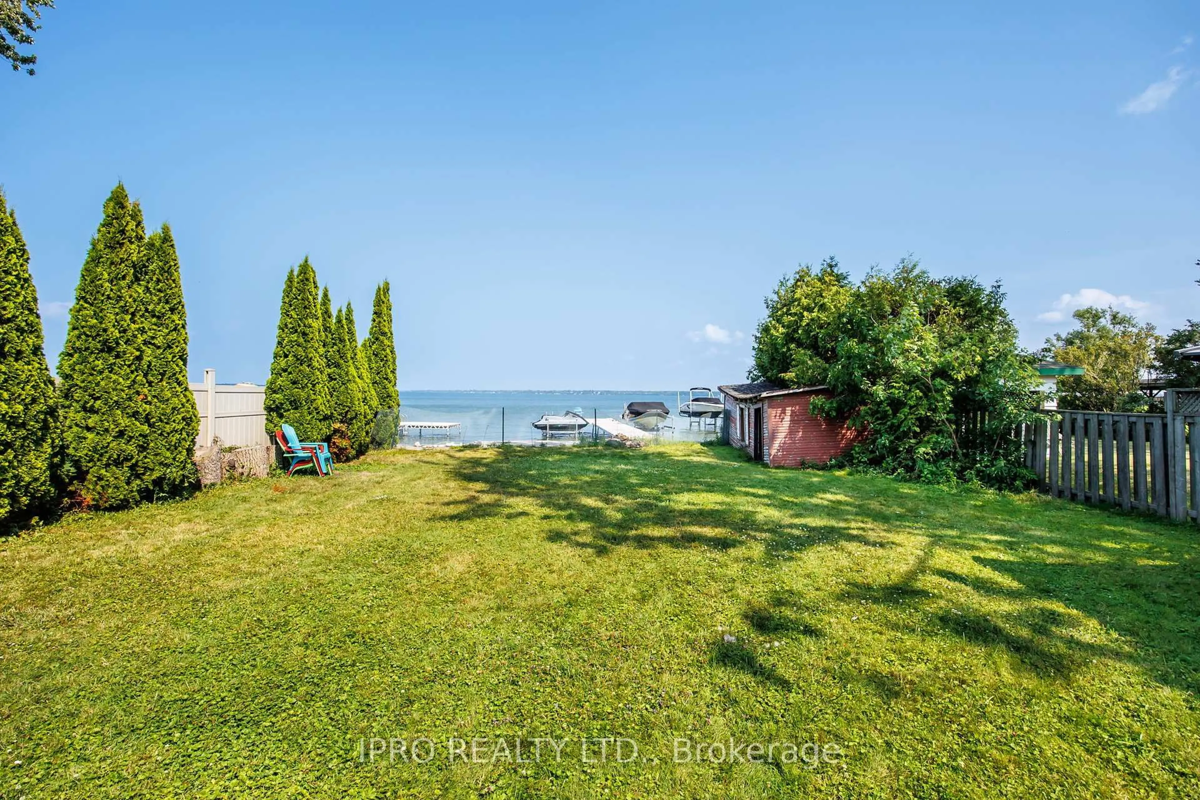 A pic from outside/outdoor area/front of a property/back of a property/a pic from drone, water/lake/river/ocean view for 1557 Houston Ave, Innisfil Ontario L9S 4M6