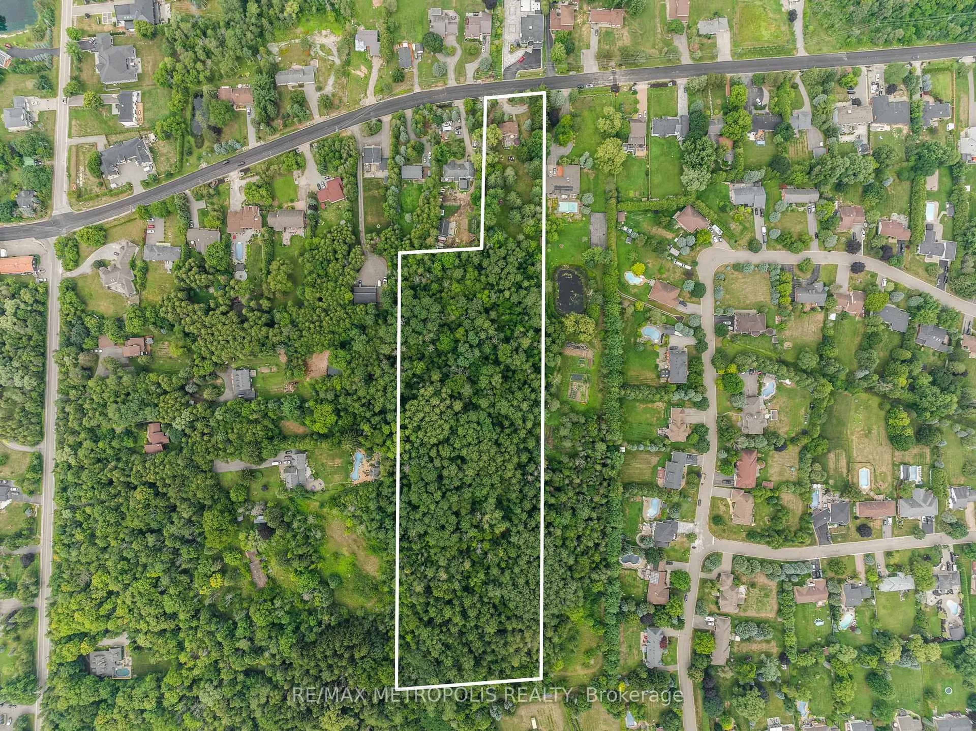 A pic from outside/outdoor area/front of a property/back of a property/a pic from drone, forest/trees view for 4359 Lloydtown Aurora Rd, King Ontario L7B 0E1