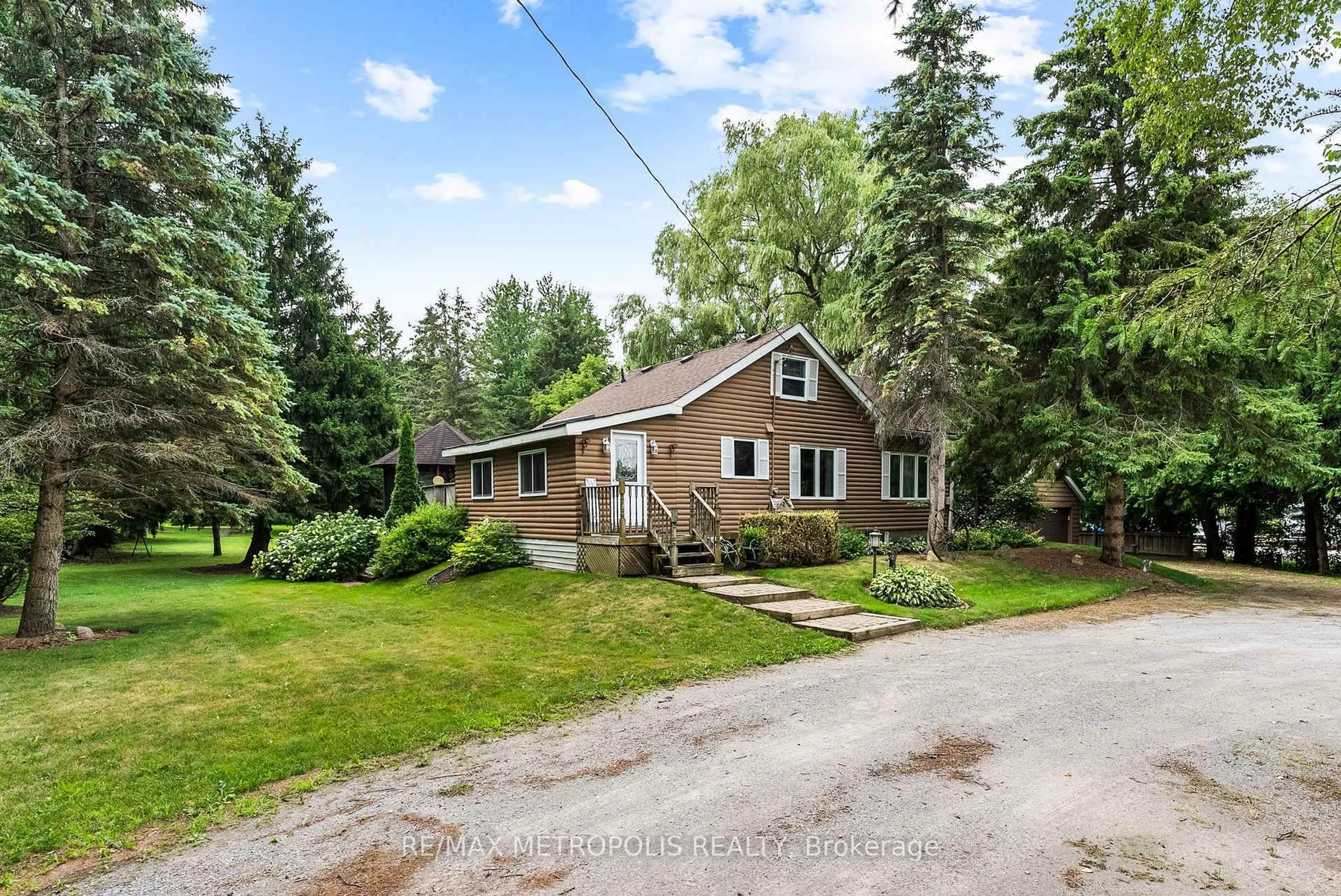 A pic from outside/outdoor area/front of a property/back of a property/a pic from drone, street for 4359 Lloydtown Aurora Rd, King Ontario L7B 0E1