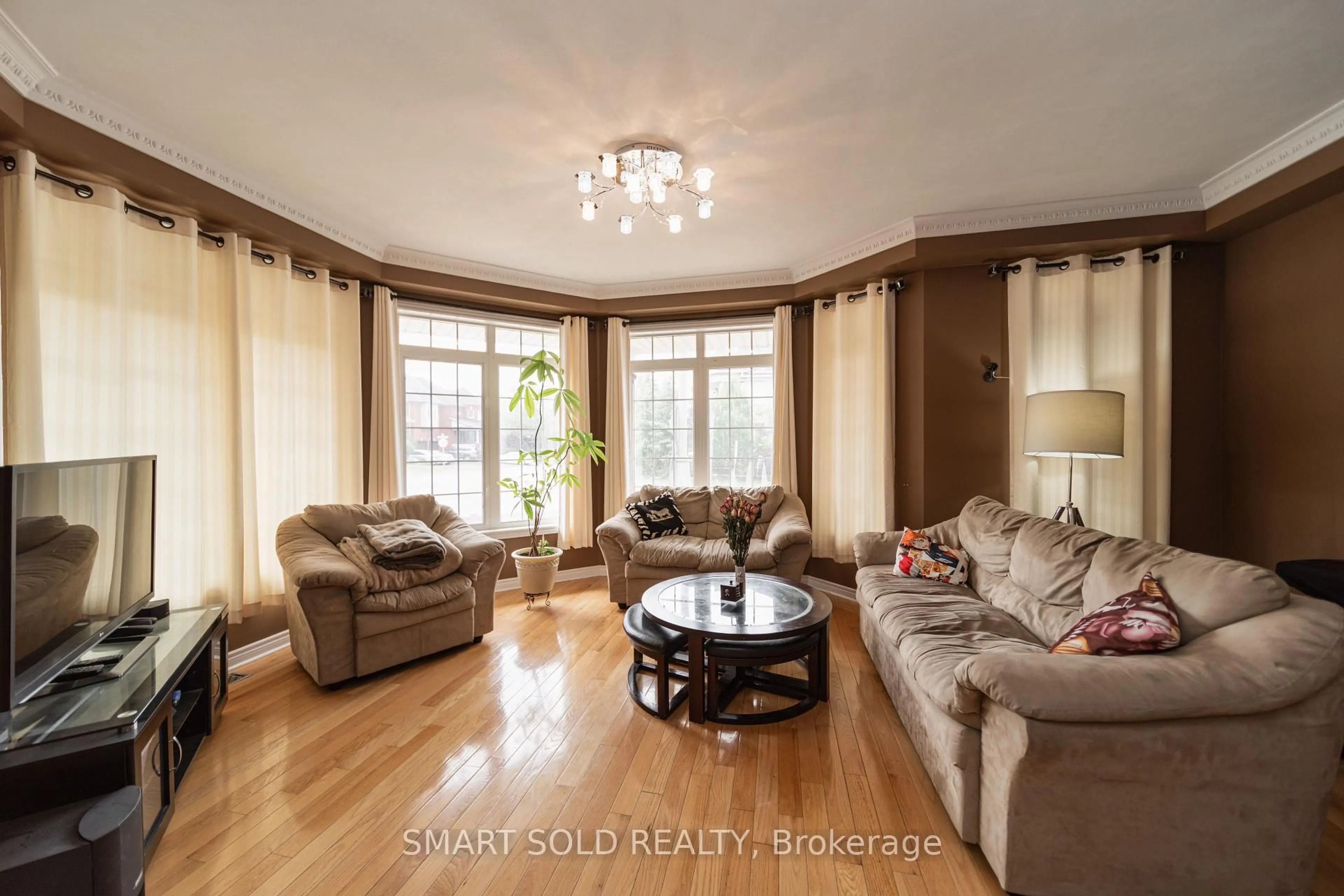 Living room with furniture, wood/laminate floor for 456 La Rocca Ave, Vaughan Ontario L4H 3J9